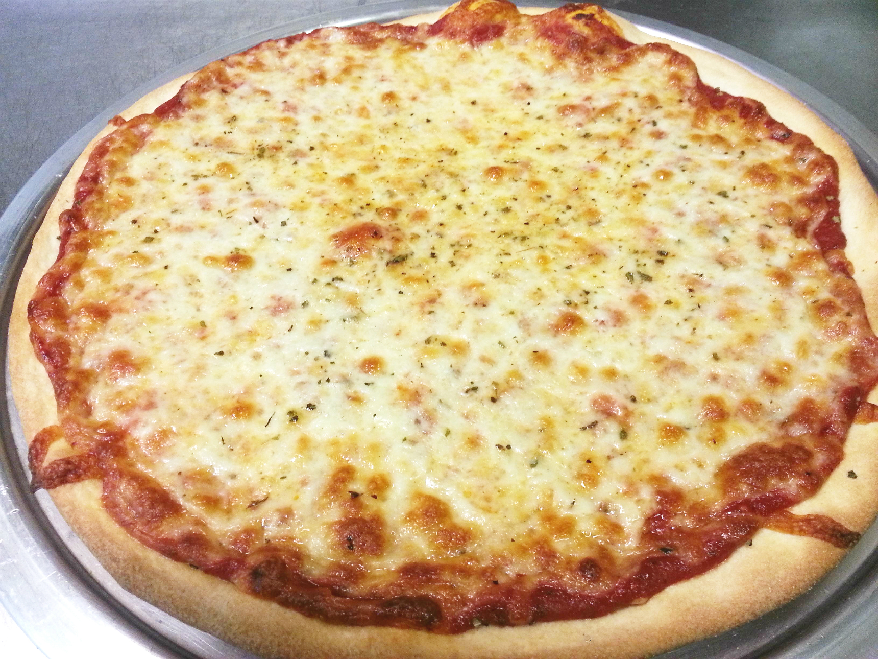 Order 12'' Thin Crust Cheese Pizza food online from Penguino's Pizza store, Buffalo Grove on bringmethat.com