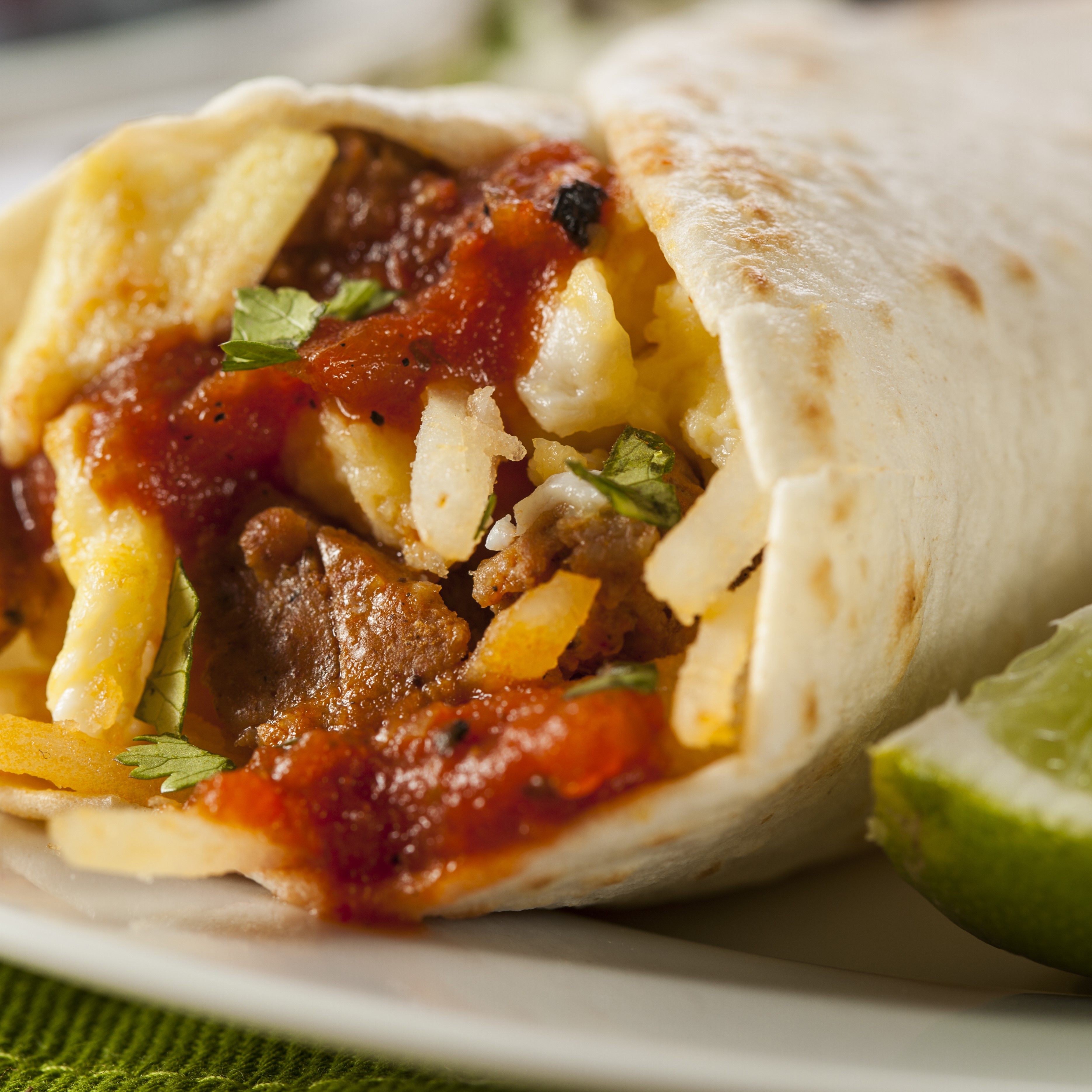Order Western with Swiss Burrito food online from West Bank Gourmet Deli store, New York on bringmethat.com
