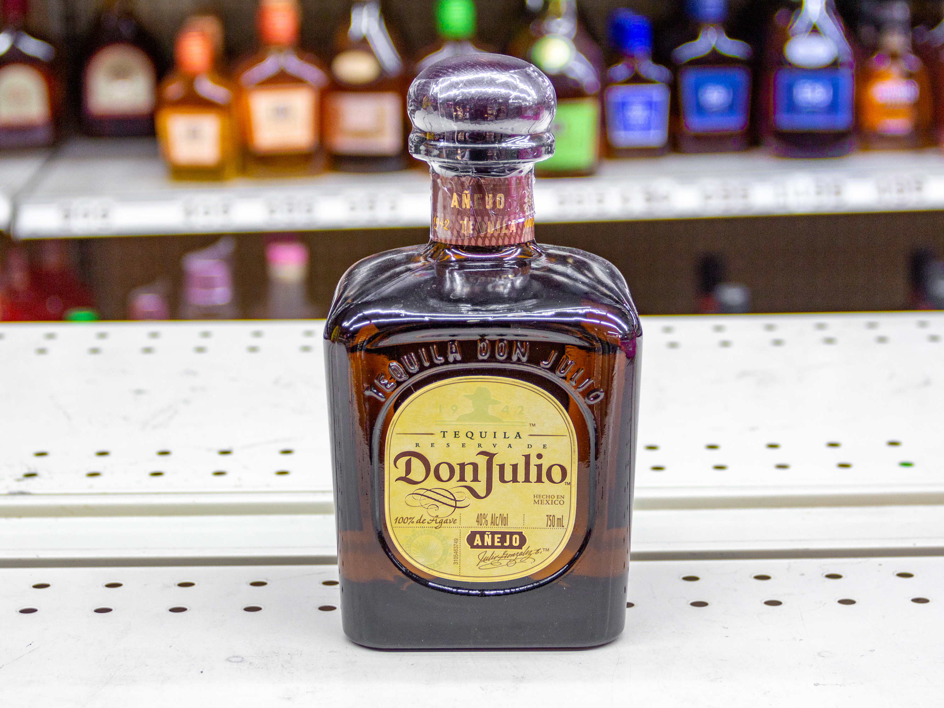 Order Donjulio tequila anejo 750ml food online from Phil Liquor store, Chino on bringmethat.com