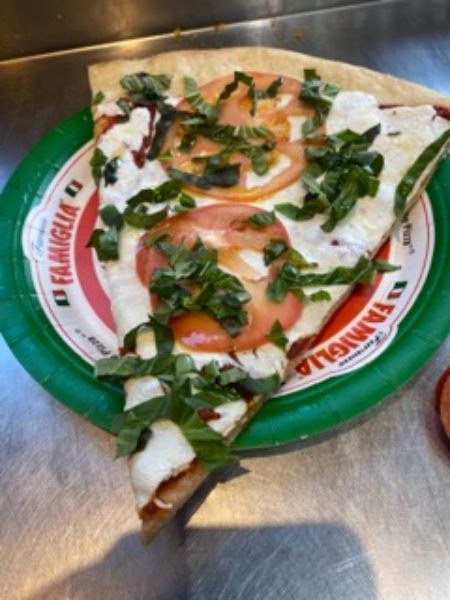 Order Fresca Slice food online from Famous famiglia pizza store, New York on bringmethat.com