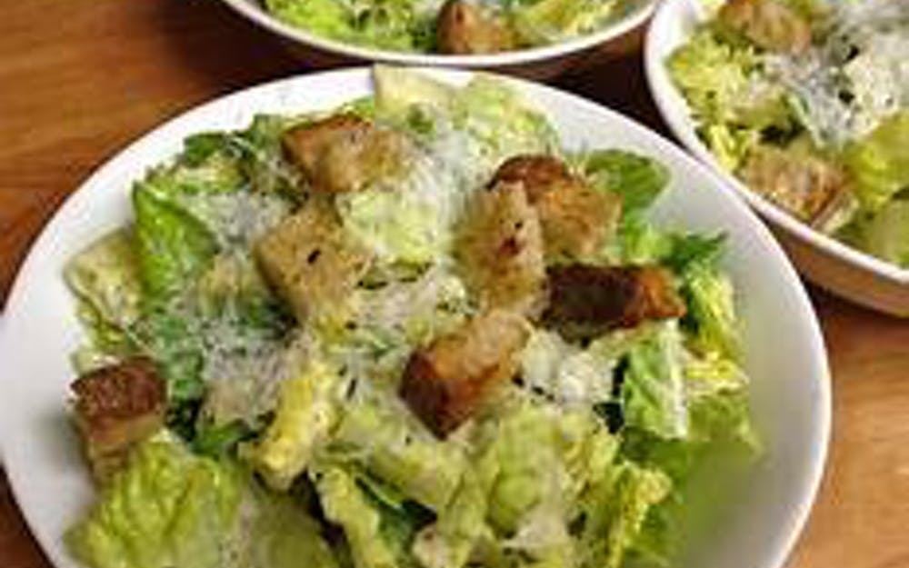 Order Caesar Salad - Small food online from Pino's Pizzeria store, Easton on bringmethat.com