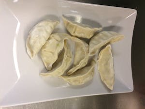 Order A9. Pot Stickers (8) food online from Juicy Claw store, Woodbridge on bringmethat.com