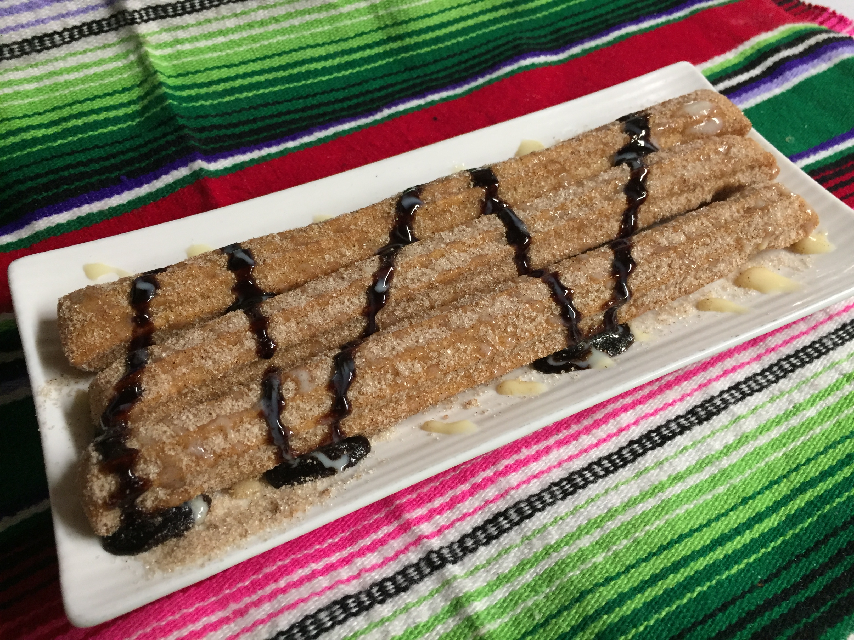 Order 3 CHURROS With Strawberry Filled food online from Montes Cafe store, Seaside Heights on bringmethat.com