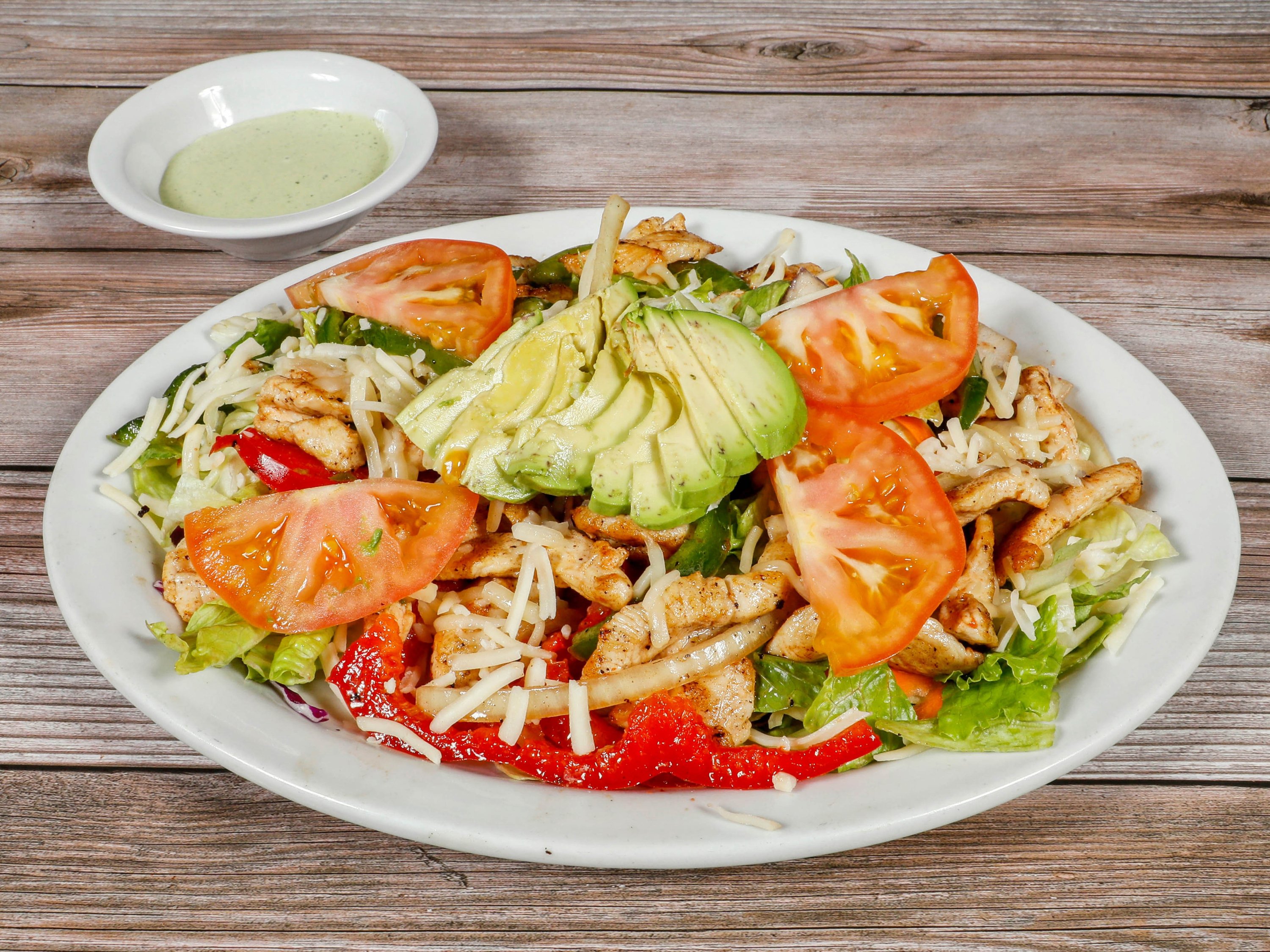 Order Fajita Salad food online from El Patio Restaurant store, Fremont on bringmethat.com