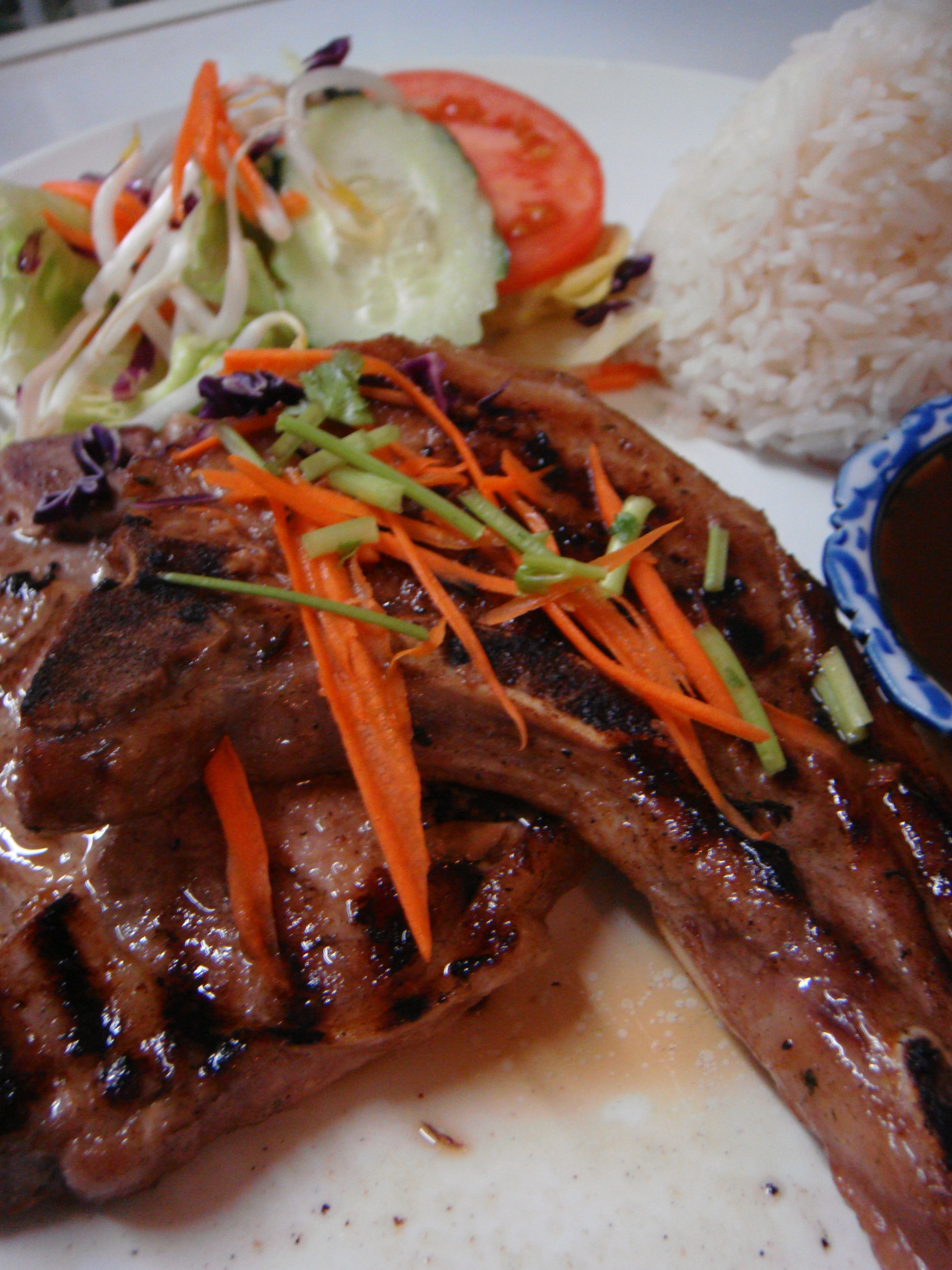 Order 24. Pork Chop food online from Thai boulevard store, Forest Hills on bringmethat.com