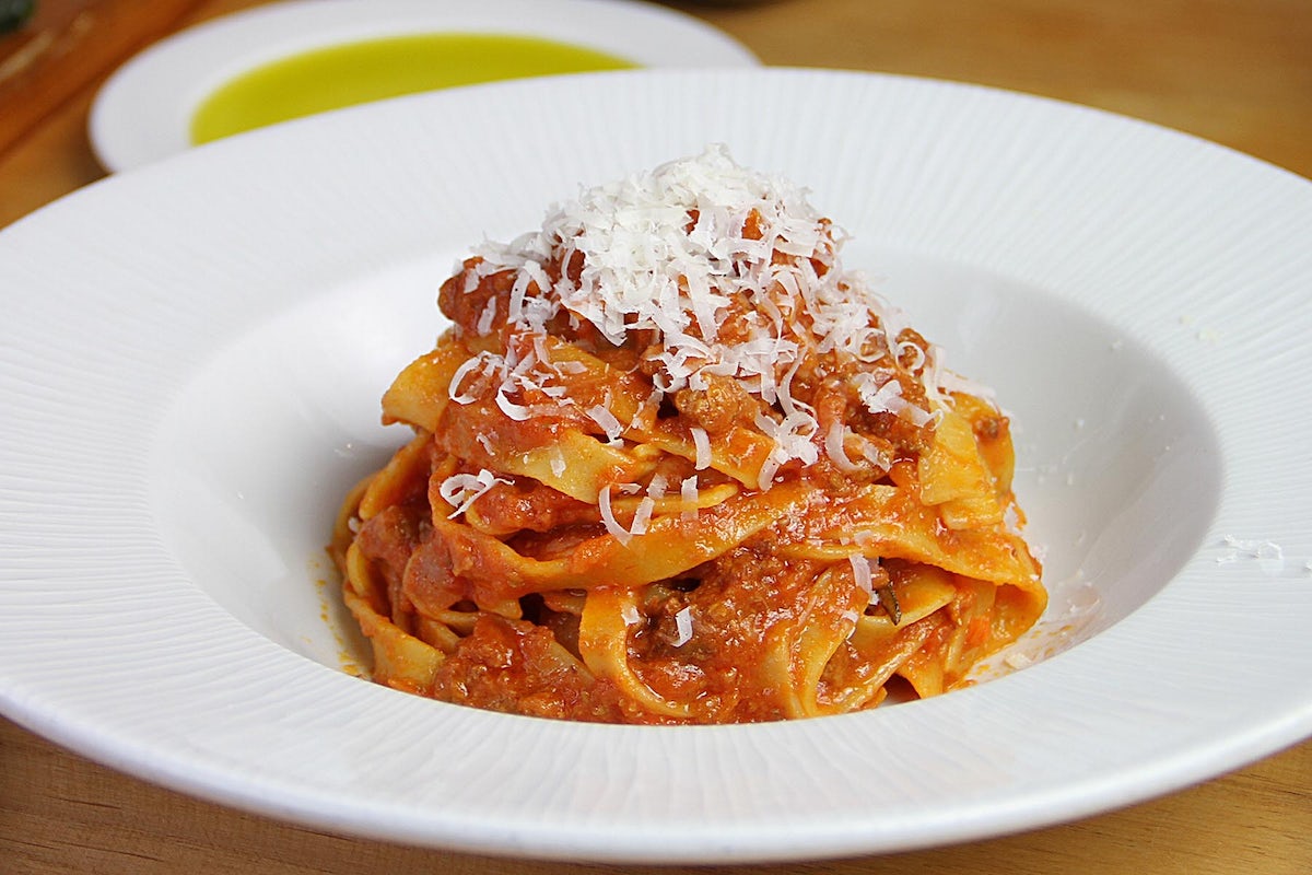 Order Tagliatelle Bolognese food online from Il Fornaio store, Burlingame on bringmethat.com