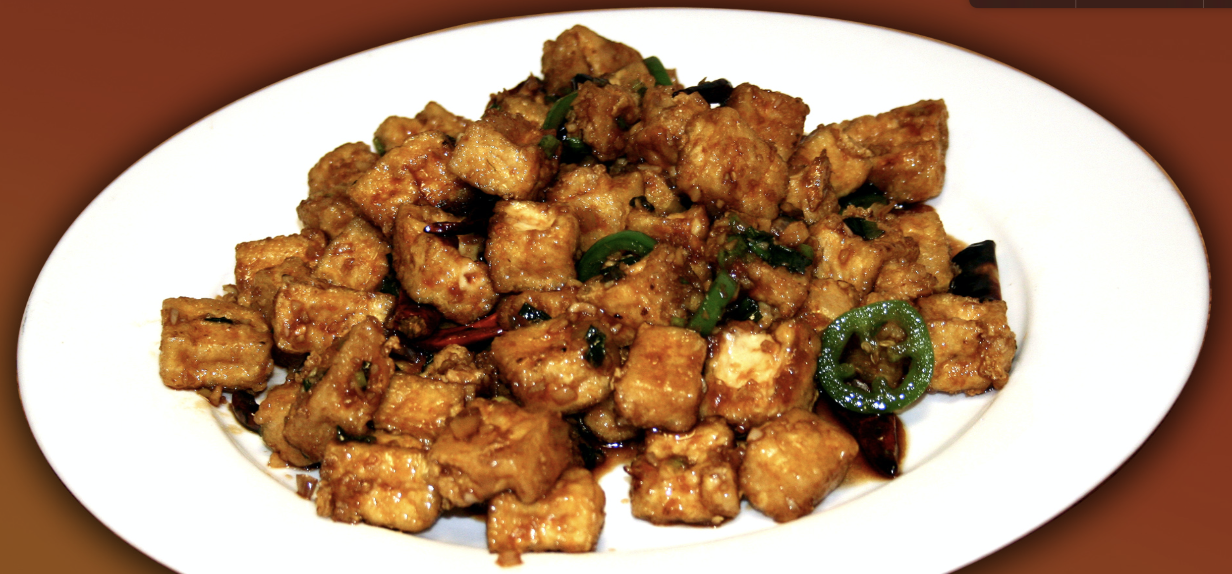 Order Crispy Tofu in Mandarin Sauce food online from Ginger Cafe store, Gilroy on bringmethat.com