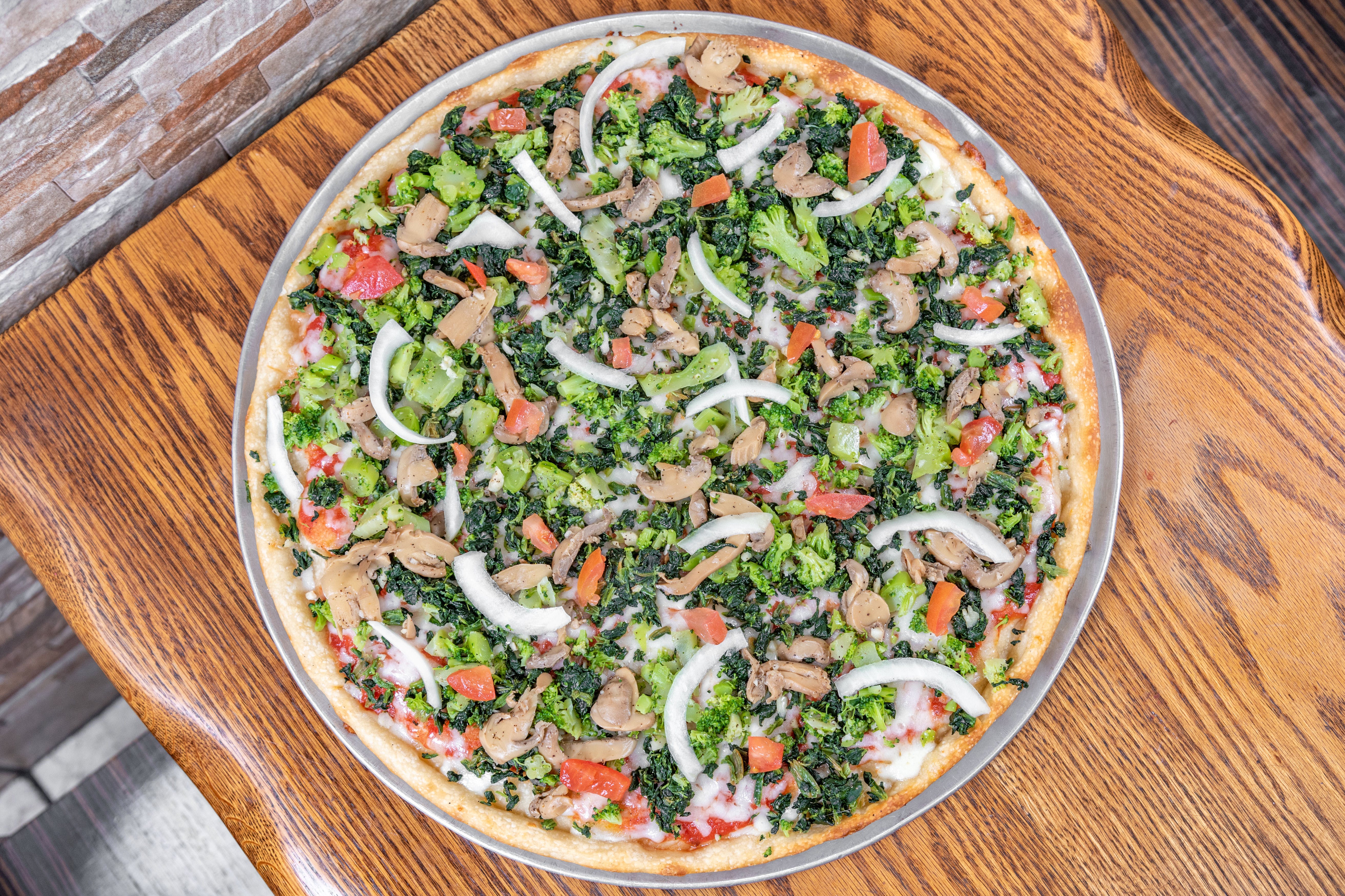 Order Vegetable Pizza - Small food online from La Casa Mia Pizzeria & Restaurante store, Brooklyn on bringmethat.com