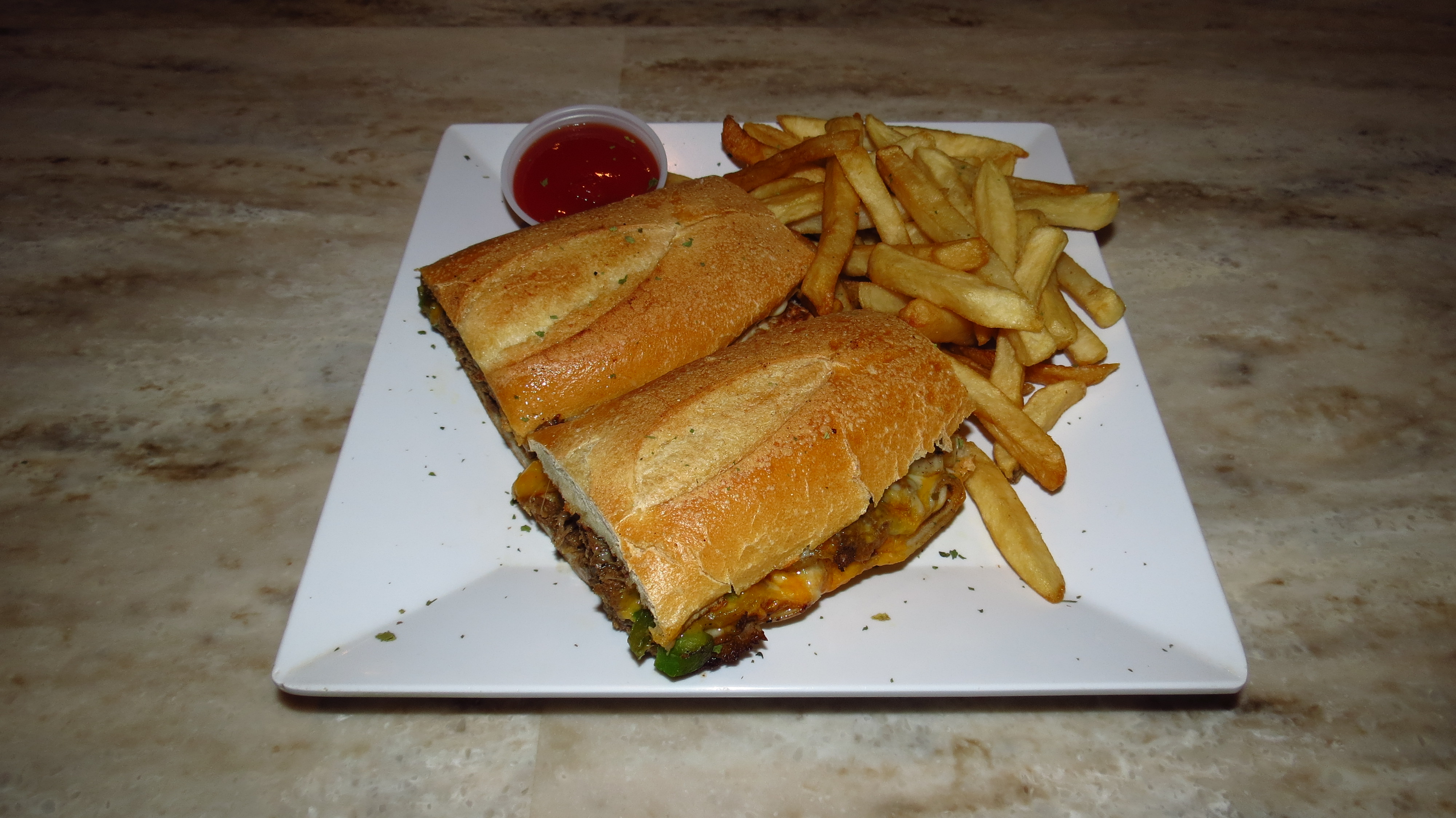 Order Philly Cheesesteak Sandwich food online from Tropix Bar & Lounge store, Rego Park on bringmethat.com