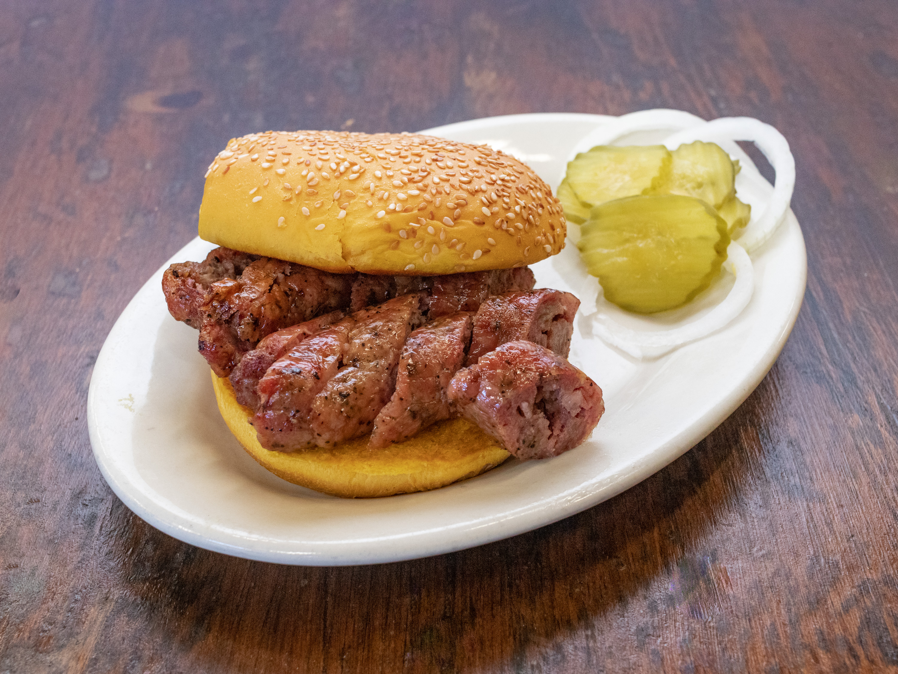 Order Regular Sausage Sandwich food online from Lyndon's Pit Bar-B-Q store, Houston on bringmethat.com
