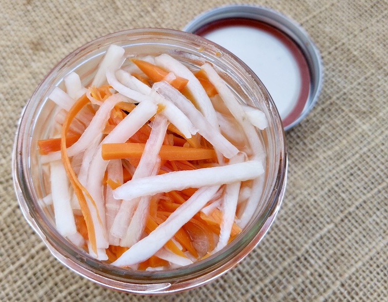 Order Daikon and Carrot Pickles ($3 Đồ chua) food online from Hello Saigon store, New York on bringmethat.com