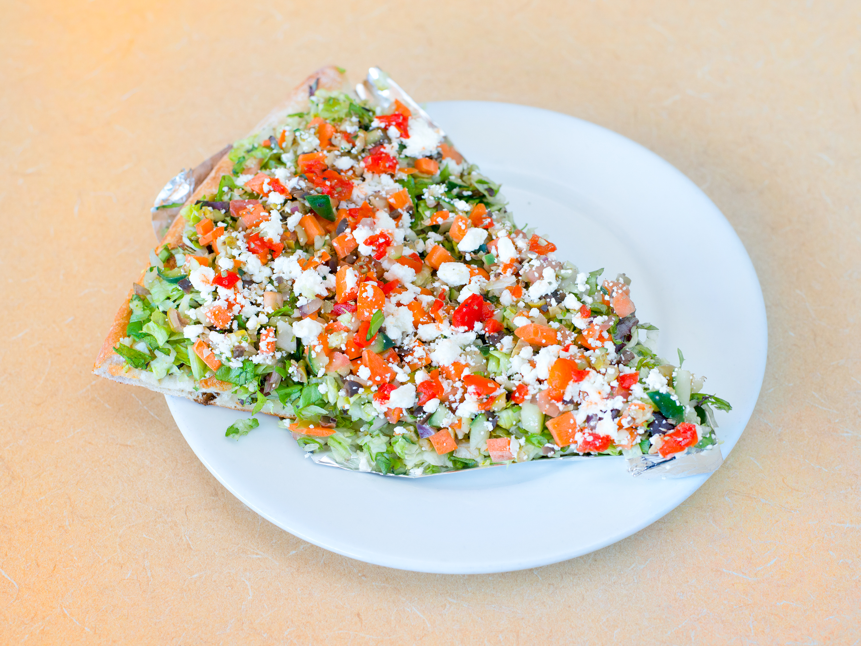 Order Salad Slice Pizza By The Slice food online from Crostini store, Massapequa on bringmethat.com