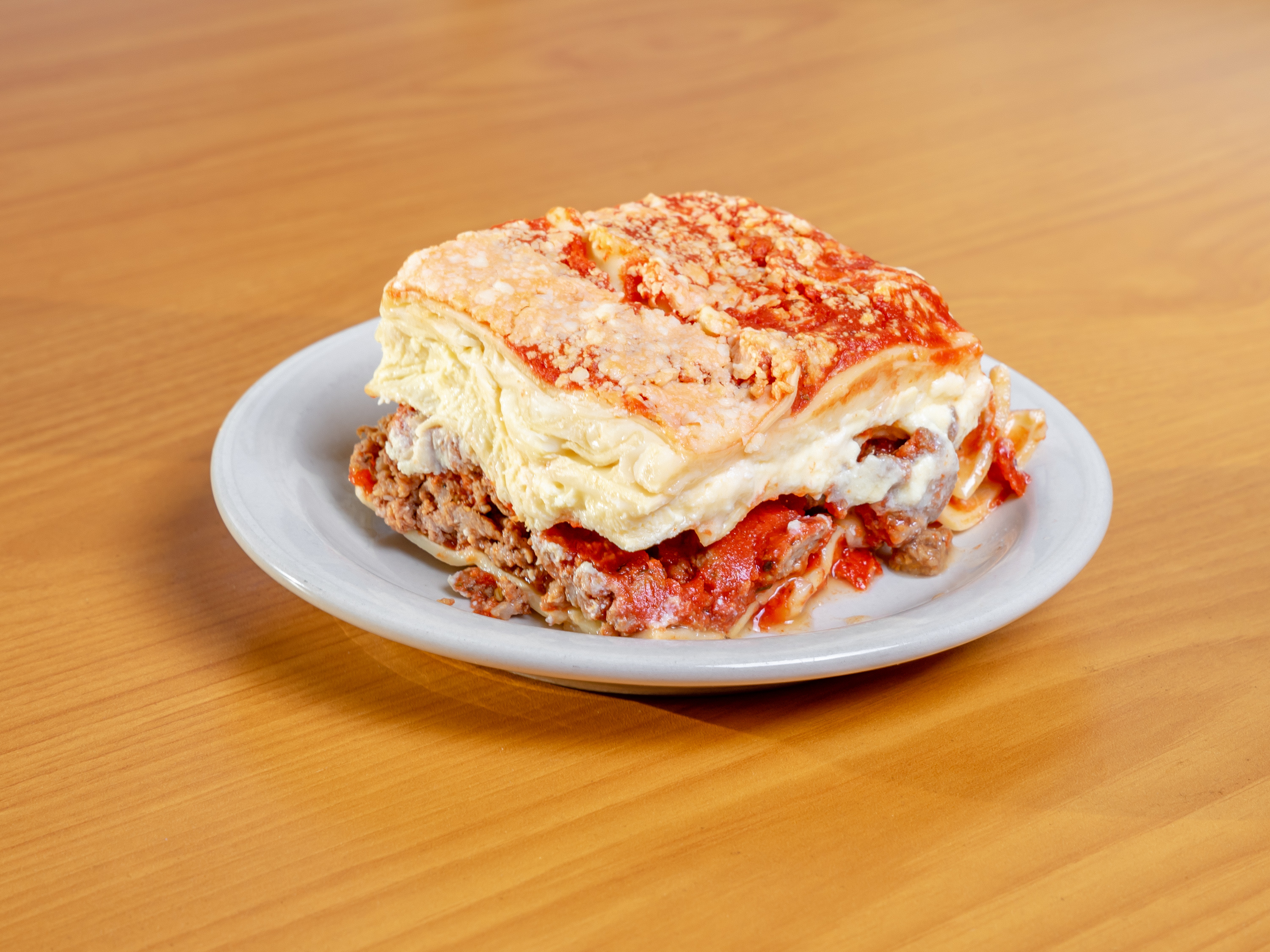 Order Mama's Lasagna food online from Papa Nicks Pizza store, Cleveland on bringmethat.com