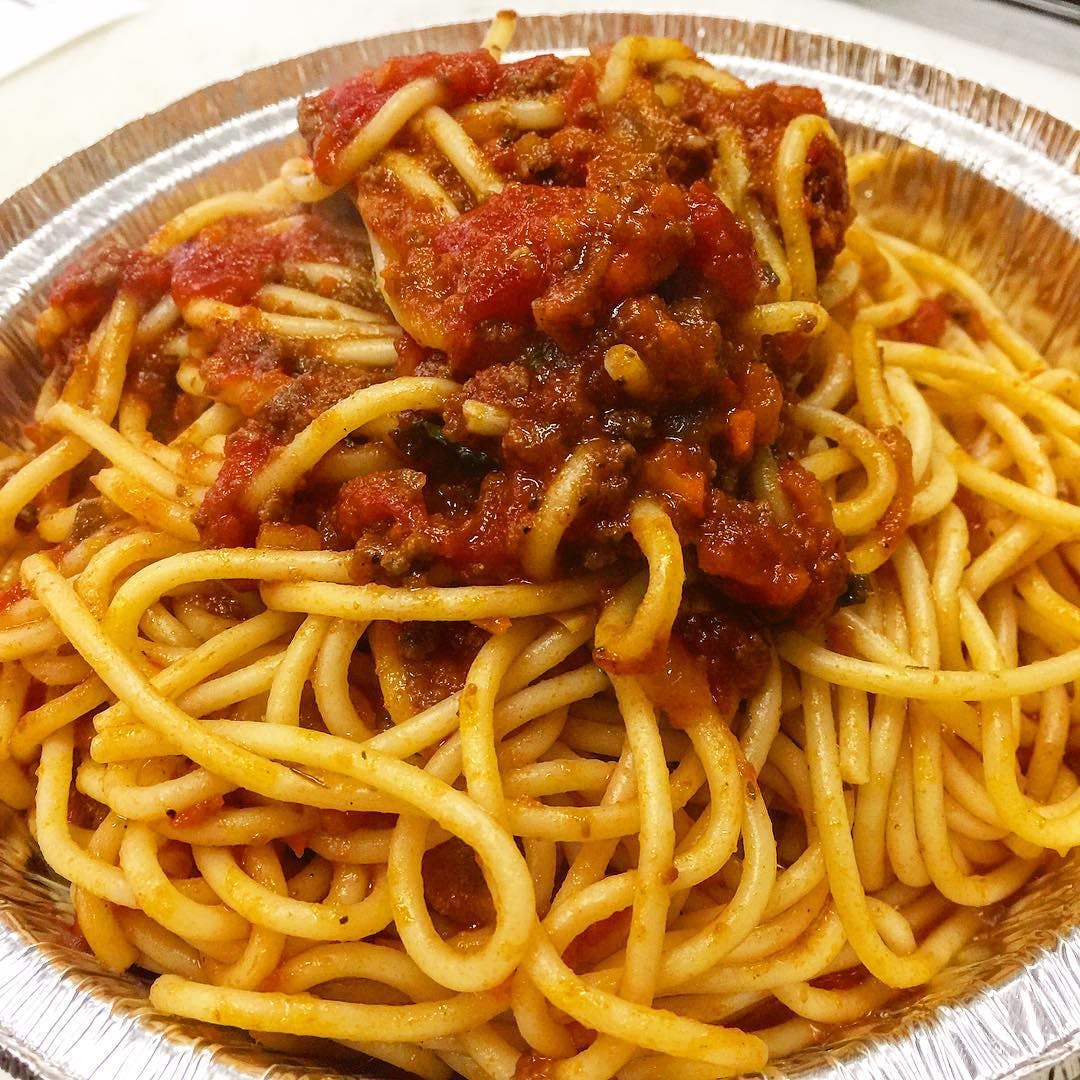Order Spaghetti Bolognese (Meat Sauce) Catering - Half Tray (Serves 6-8) food online from Verdugo Pizza store, Glendale on bringmethat.com