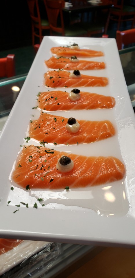 Order Salmon carpaccio food online from O Sumo Sushi store, Sherman Oaks on bringmethat.com