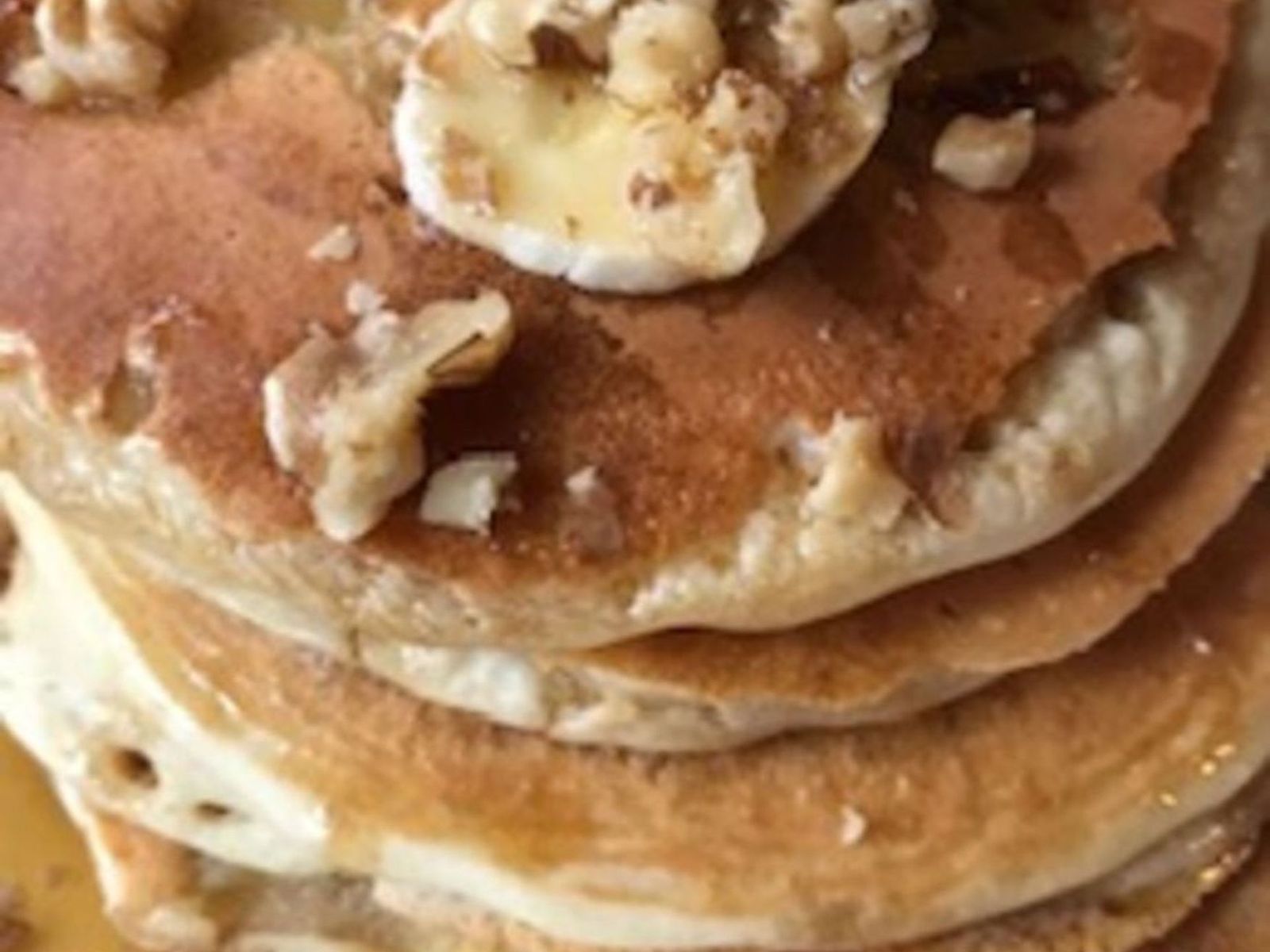 Order Banana Walnuts Pancakes food online from Bus stop cafe store, New York on bringmethat.com