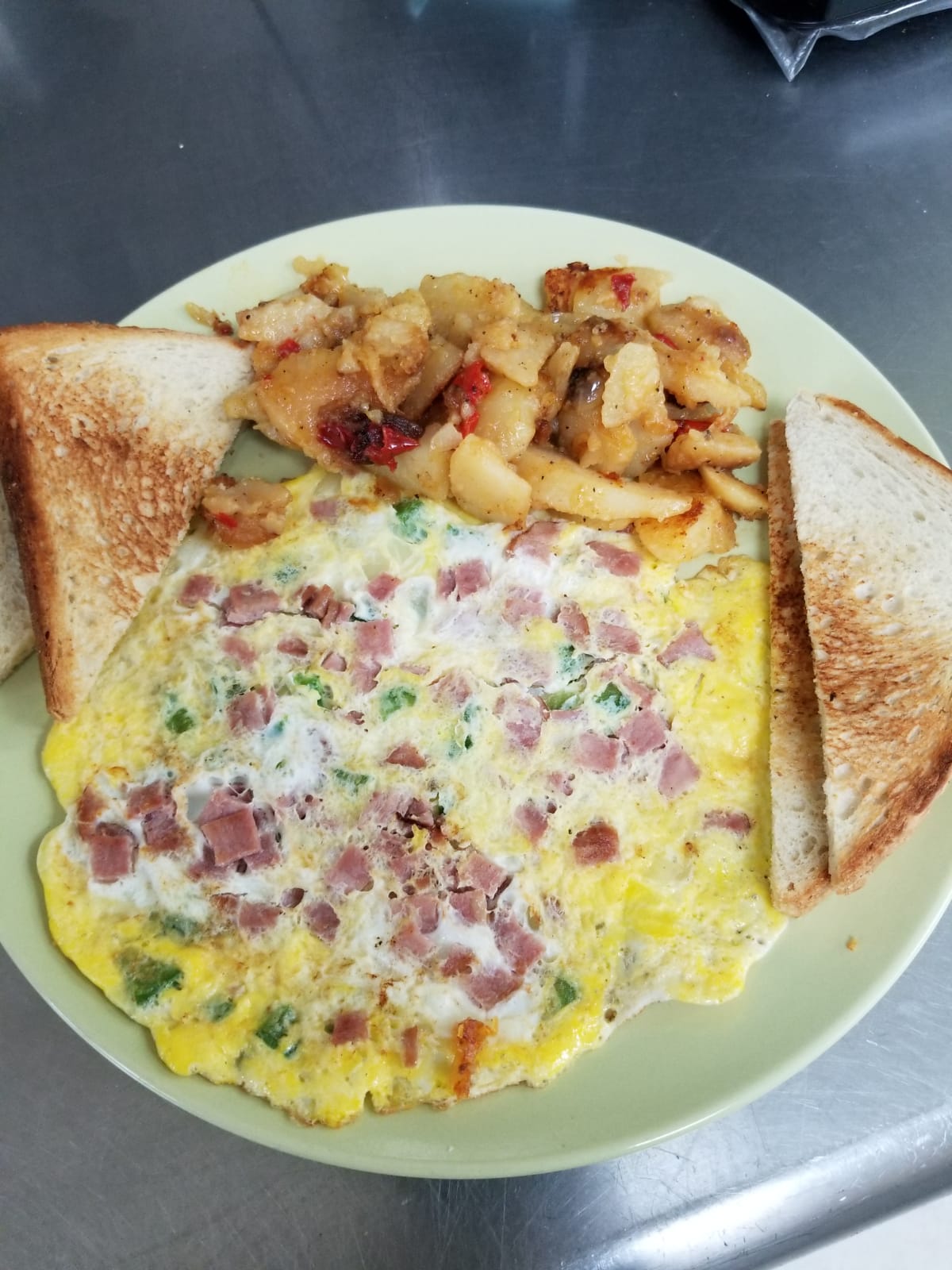 Order western omelette food online from Aminas Cafe store, Bronx on bringmethat.com