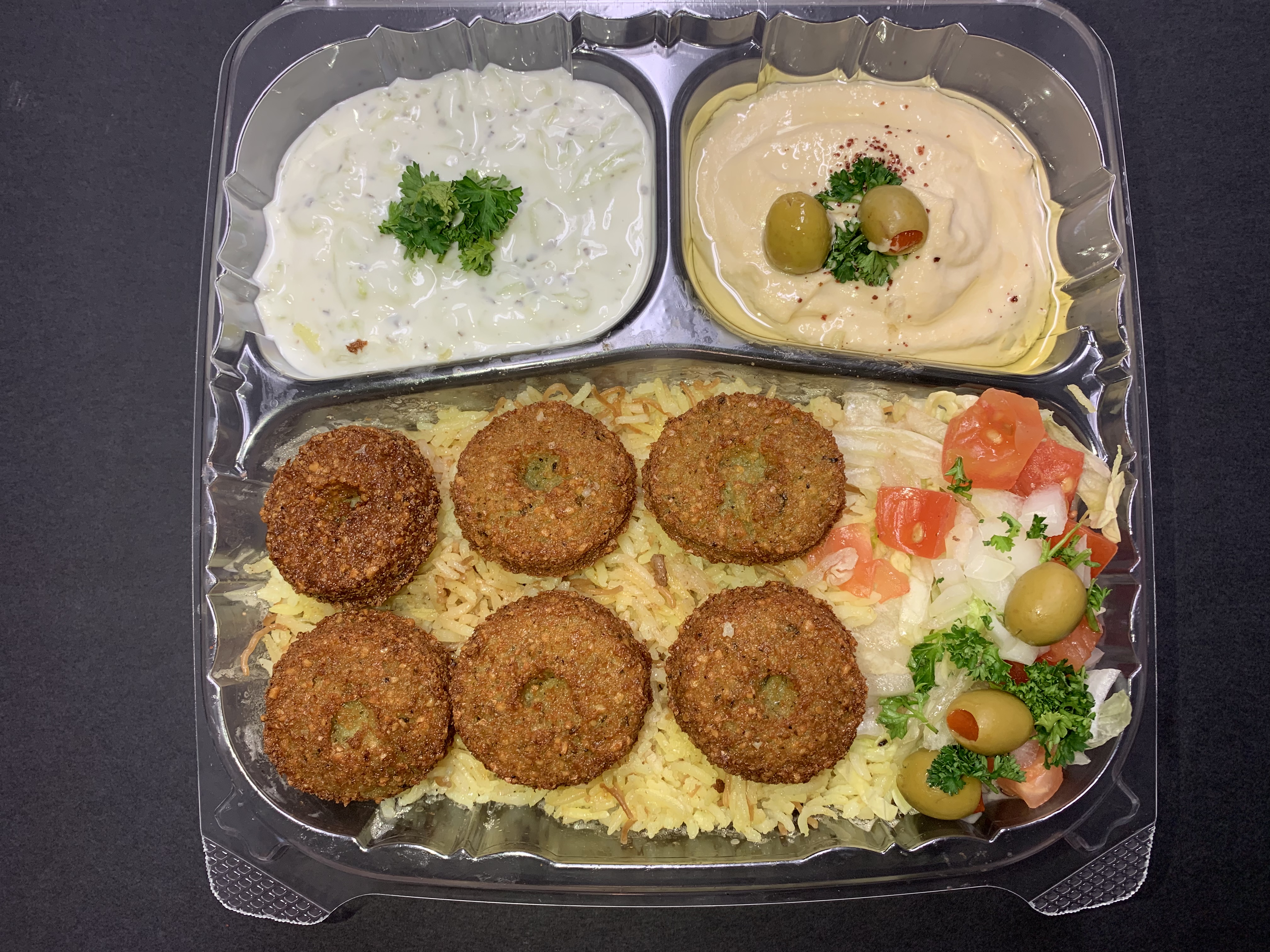 Order Falafel Plate With Pita Bread (Vegetarian) صـحن فـلافل  food online from Abu Omar Gyros & Shawarma store, Portland on bringmethat.com
