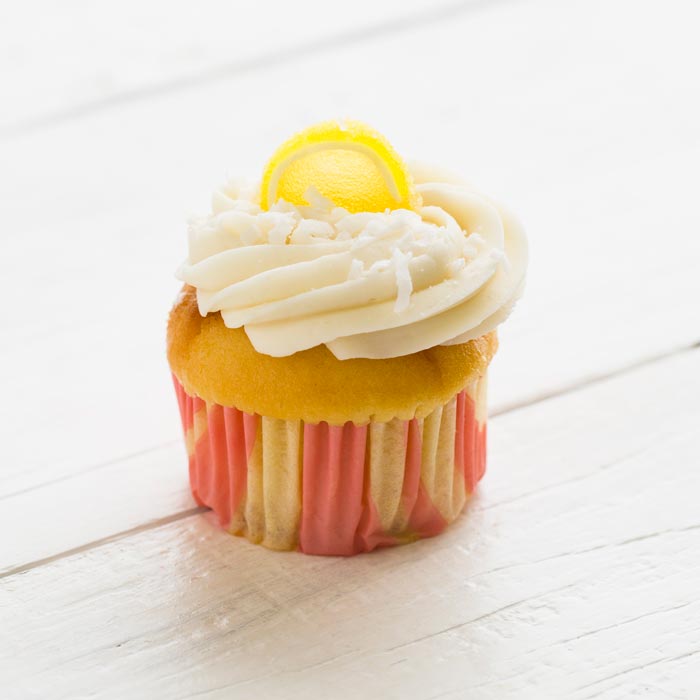 Order Lemon Coconut Cloud Cupcake food online from The Coffee Mill store, Oakland on bringmethat.com