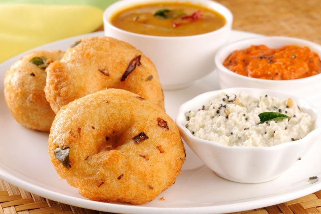 Order Medhu Vada food online from Madras Cafe store, San Diego on bringmethat.com