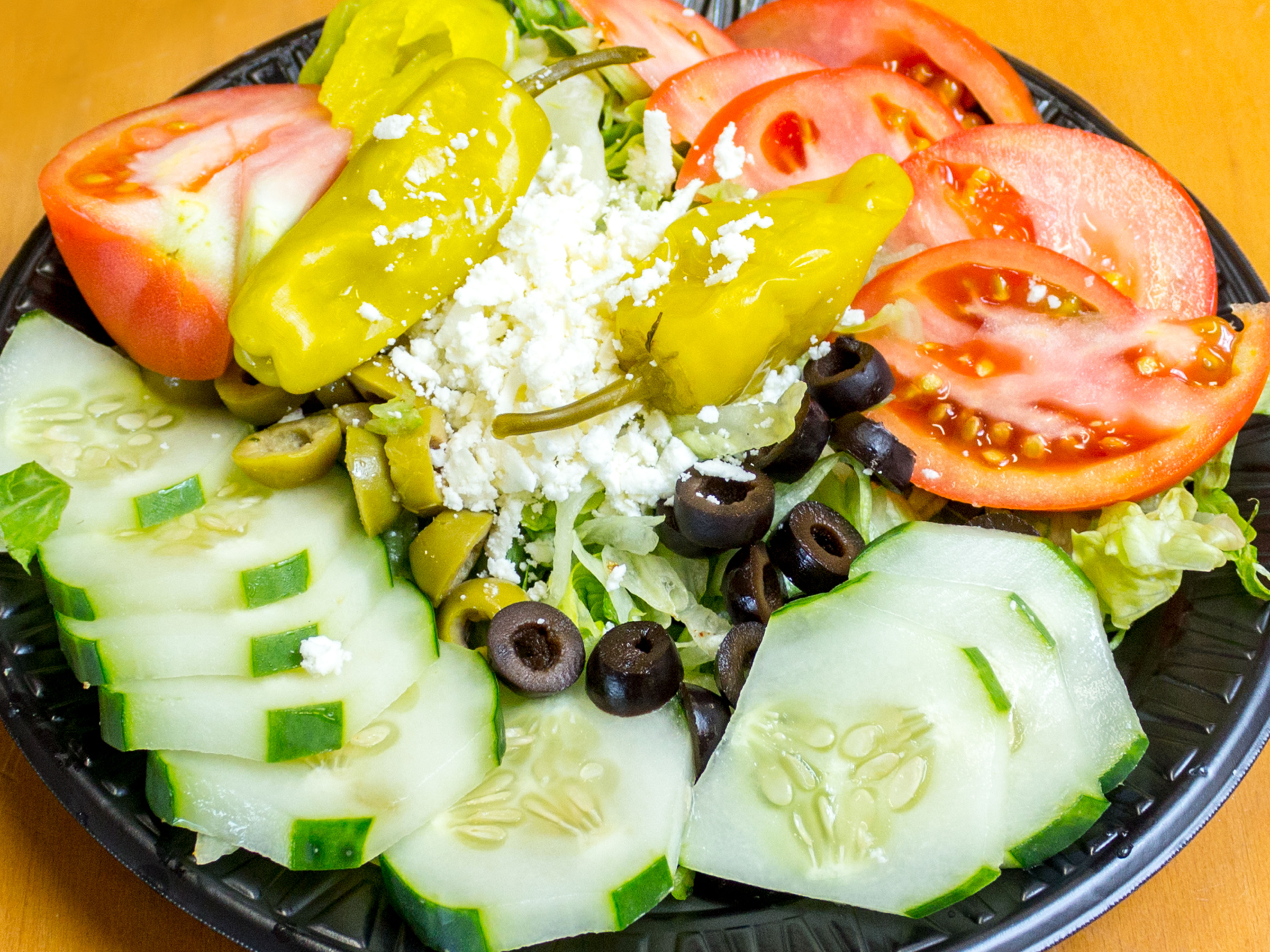 Order D1. Greek Salad food online from Taza Grill store, Raleigh on bringmethat.com
