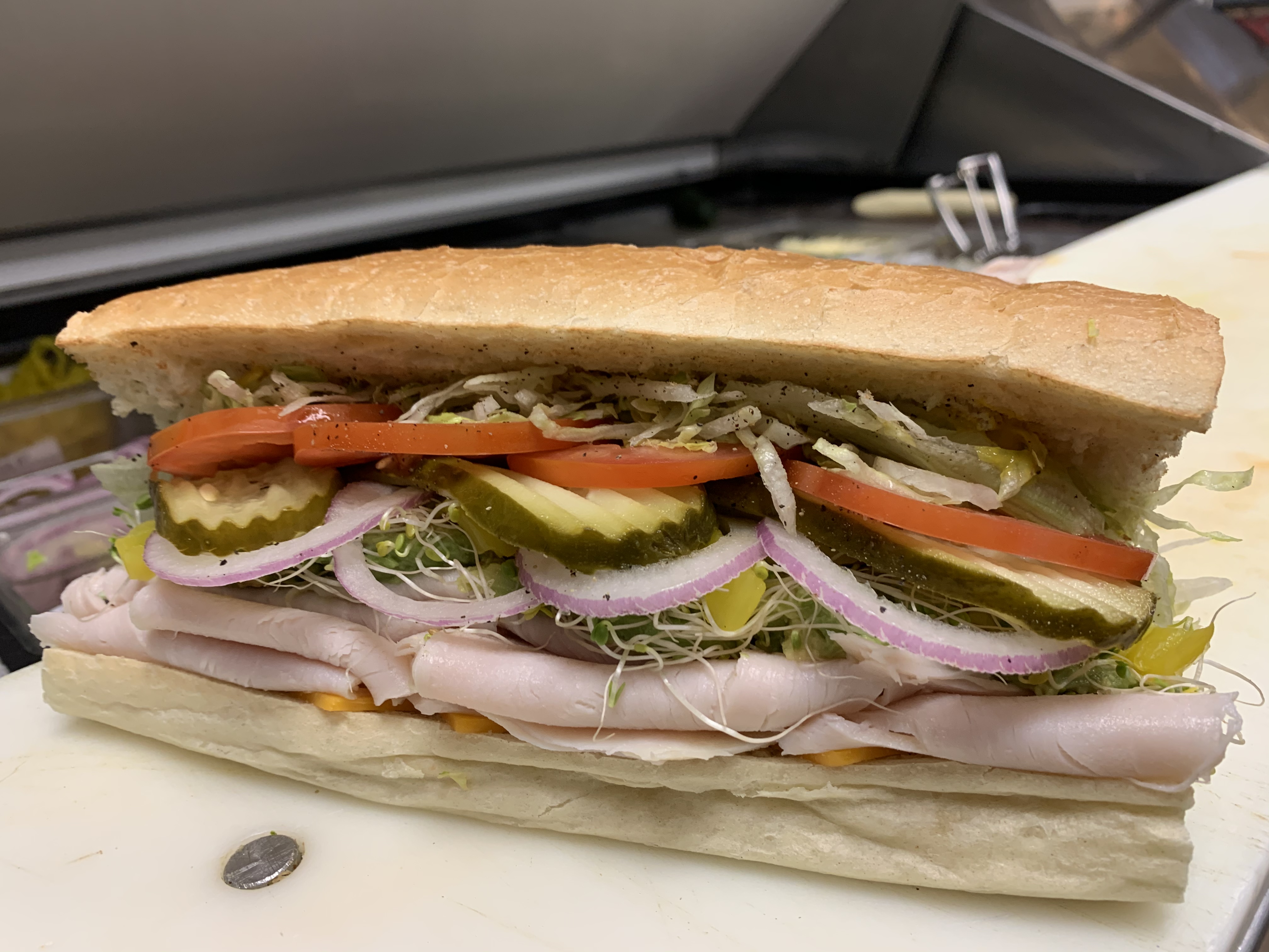 Order 1. Turkey, Sprouts, Avocado and Cream Cheese Sandwich food online from The Pickled Deli store, Visalia on bringmethat.com