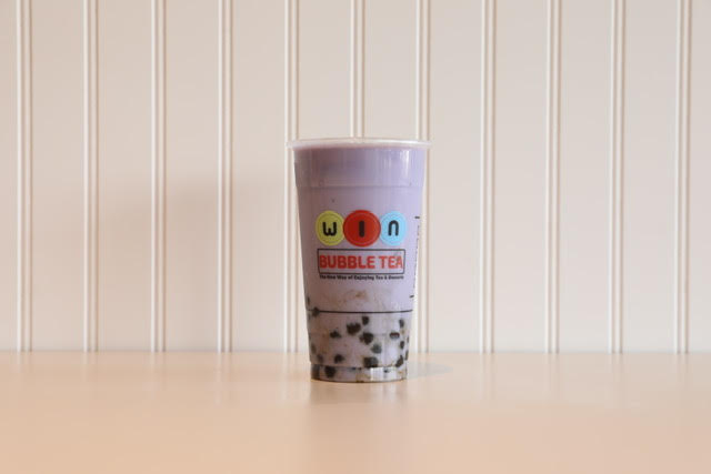 Order Milk Tea Taro food online from WIN Bubble Tea store, Nashville on bringmethat.com