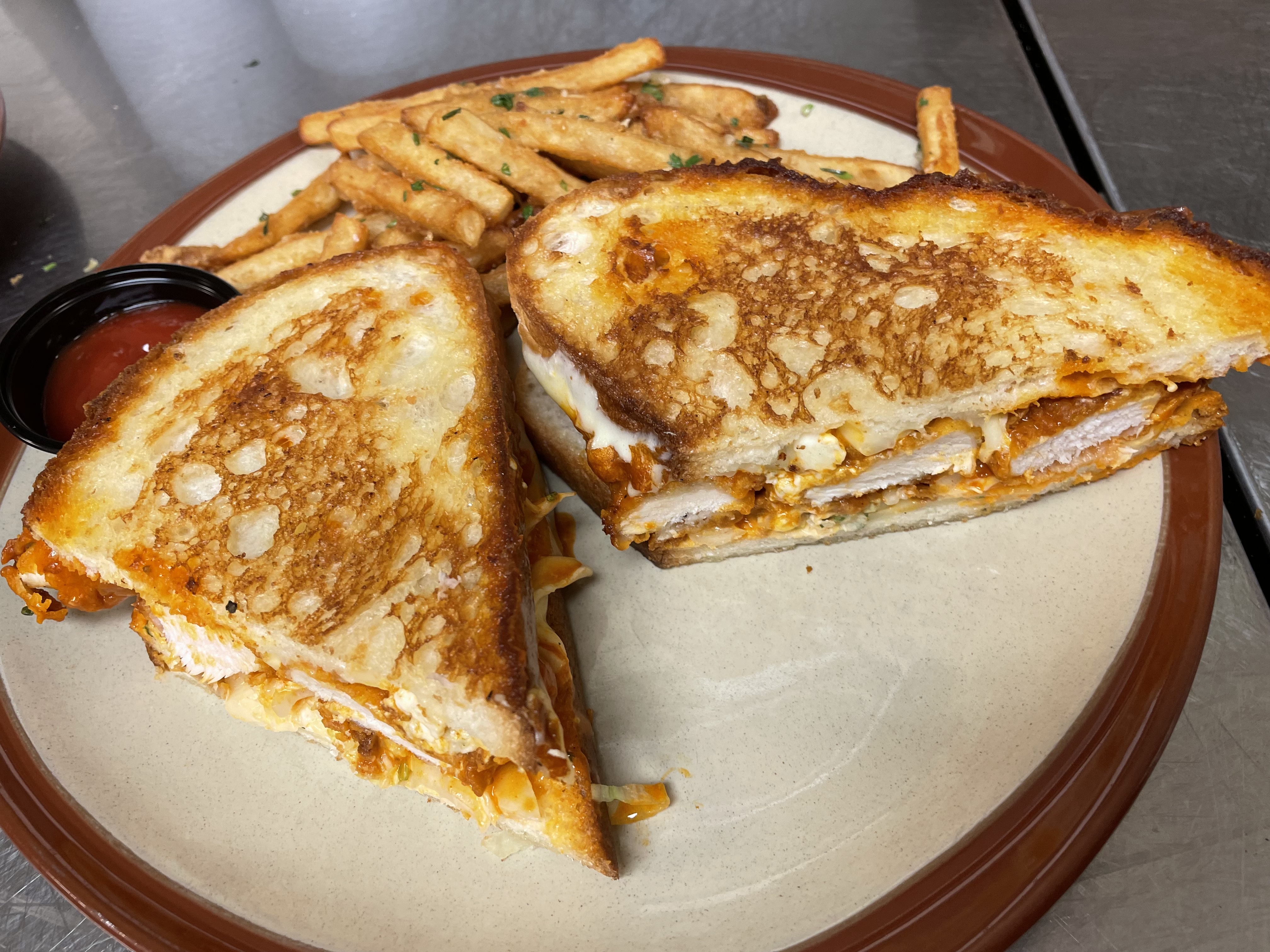 Order Buffalo chicken Panini  food online from Groundlevel 105 store, Lombard on bringmethat.com