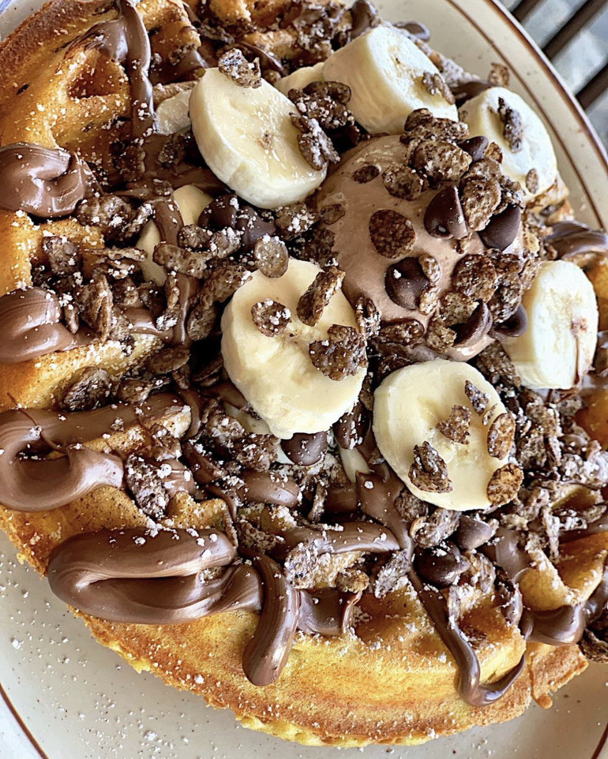 Order Cocoa Pebbles Waffle With Nutella & Banana food online from Eat'n Park store, Burbank on bringmethat.com