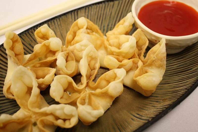 Order 7. Crab Rangoon food online from New Wong Chinese Restaurant store, Wickliffe on bringmethat.com