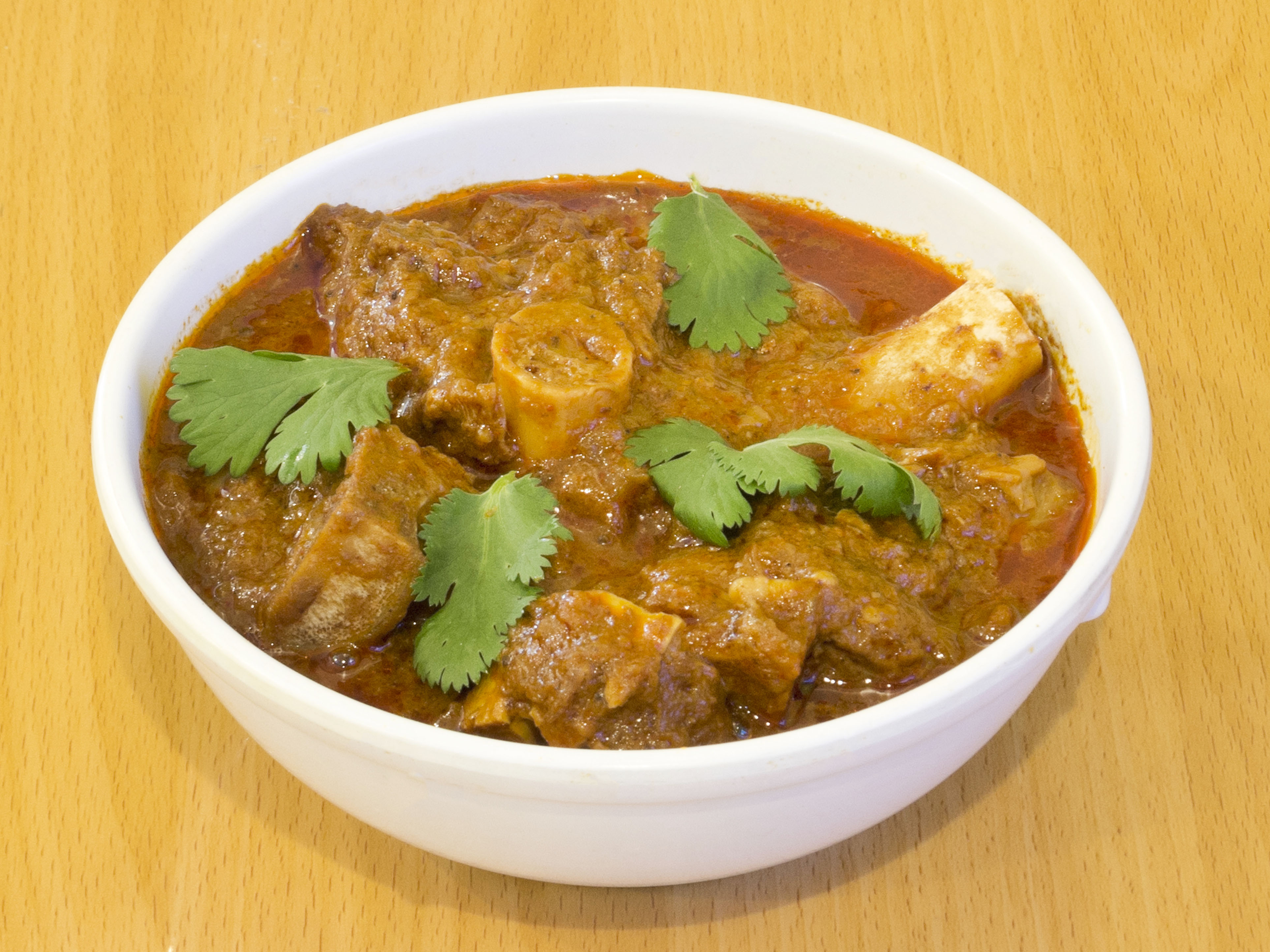 Order Hyderabad Goat Curry food online from Pista House store, Irving on bringmethat.com
