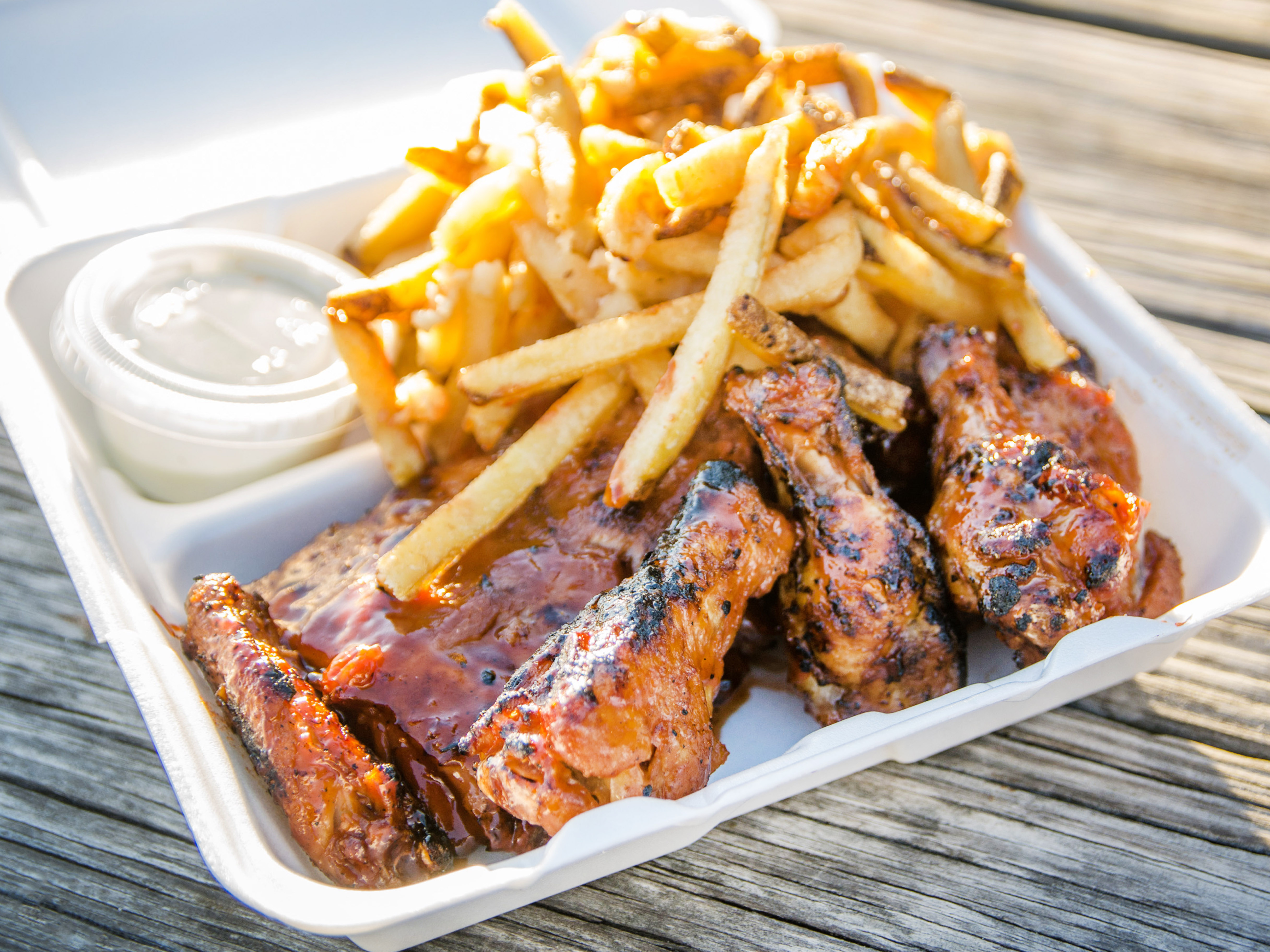Order 1/2 Rack of Ribs, 5 Wings, Fries and Bleu Cheese food online from Charcoal Deli store, Cockeysville on bringmethat.com
