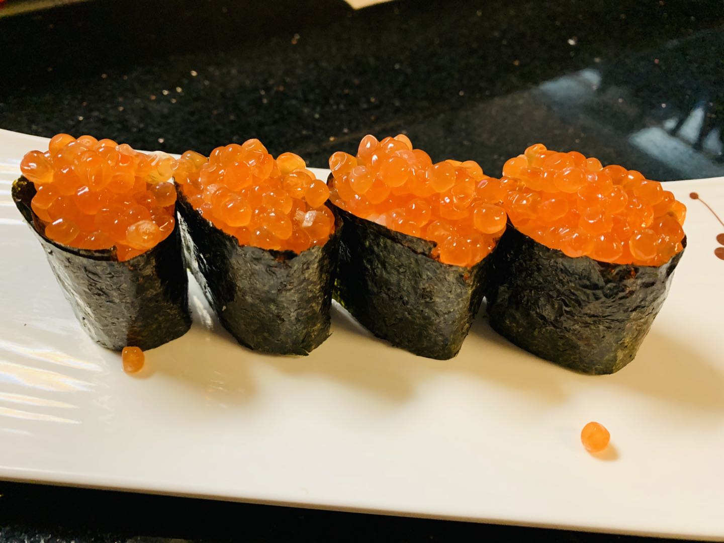Order 2 Pieces Salmon Roe Sushi food online from Super Sushi store, Las Vegas on bringmethat.com