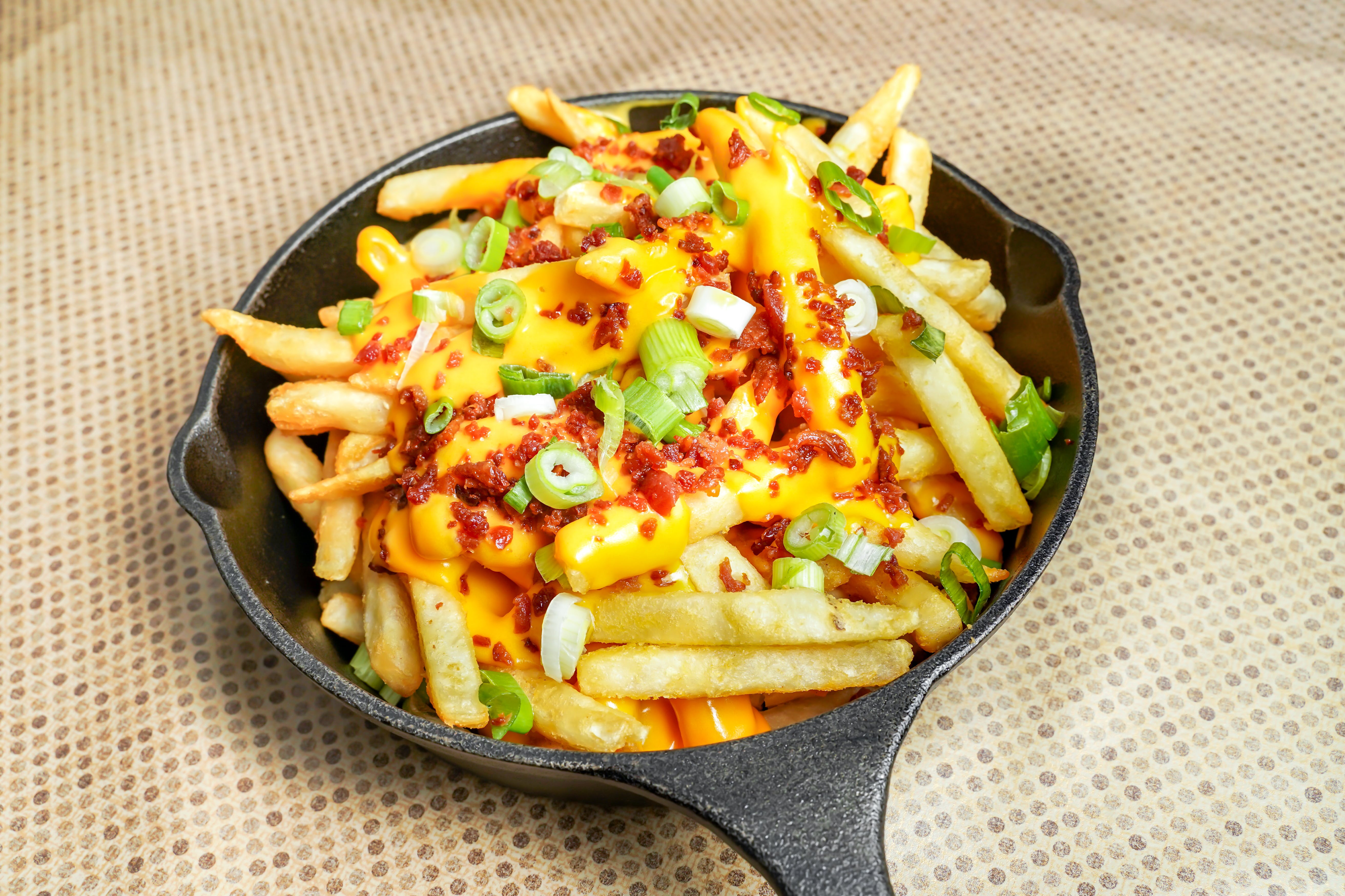 Order Loaded Fries - Appetizer food online from Connies Pizza By The Pier store, Chicago on bringmethat.com
