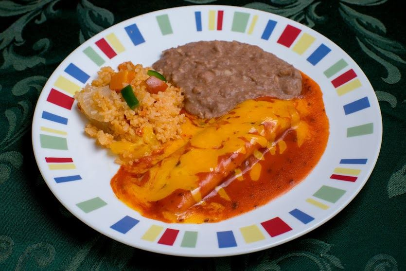 Order Enchilada food online from Dona Chela Restaurant store, Houston on bringmethat.com
