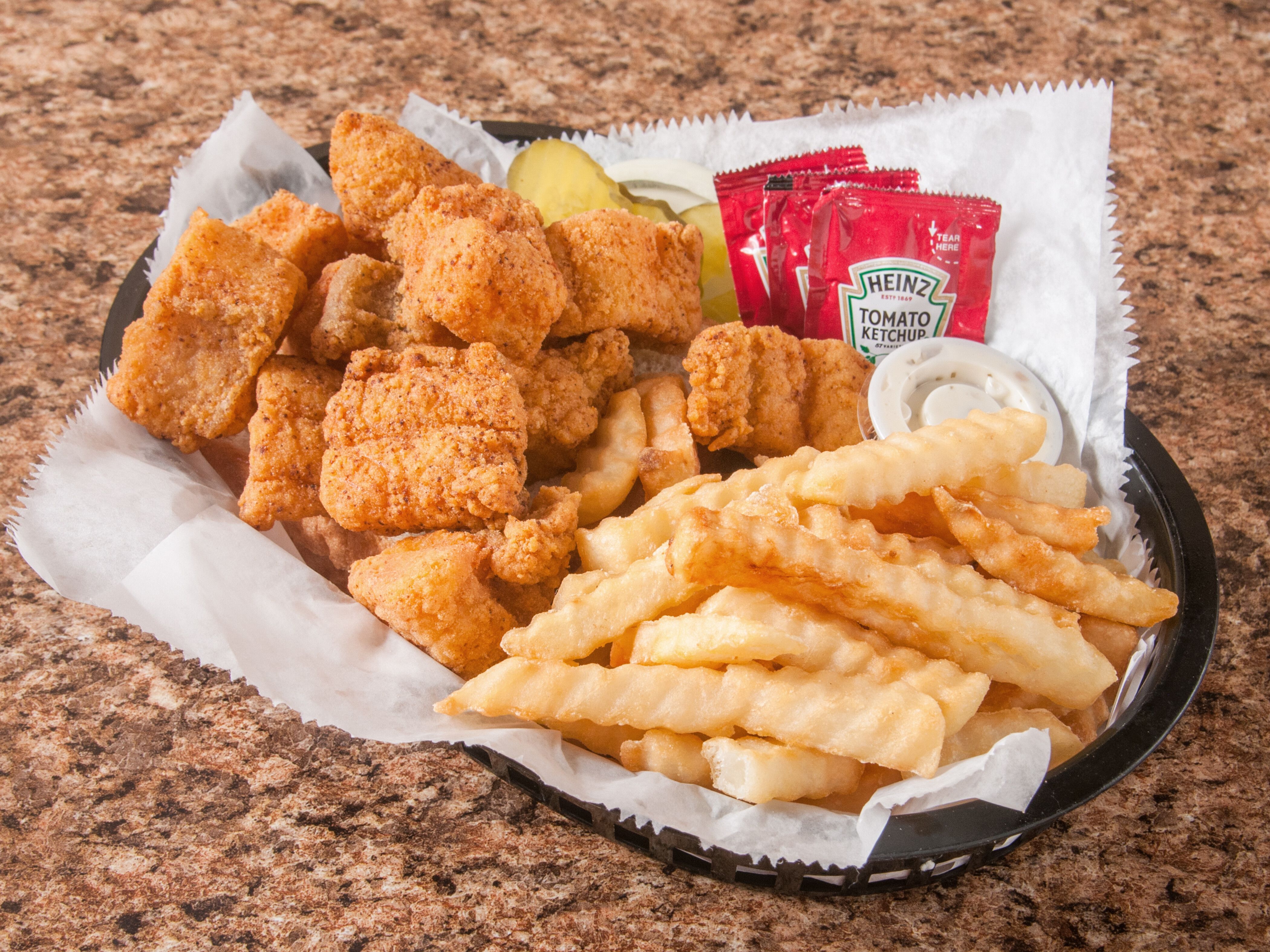 Order Catfish Nuggets food online from Get N' Go Fish store, Omaha on bringmethat.com