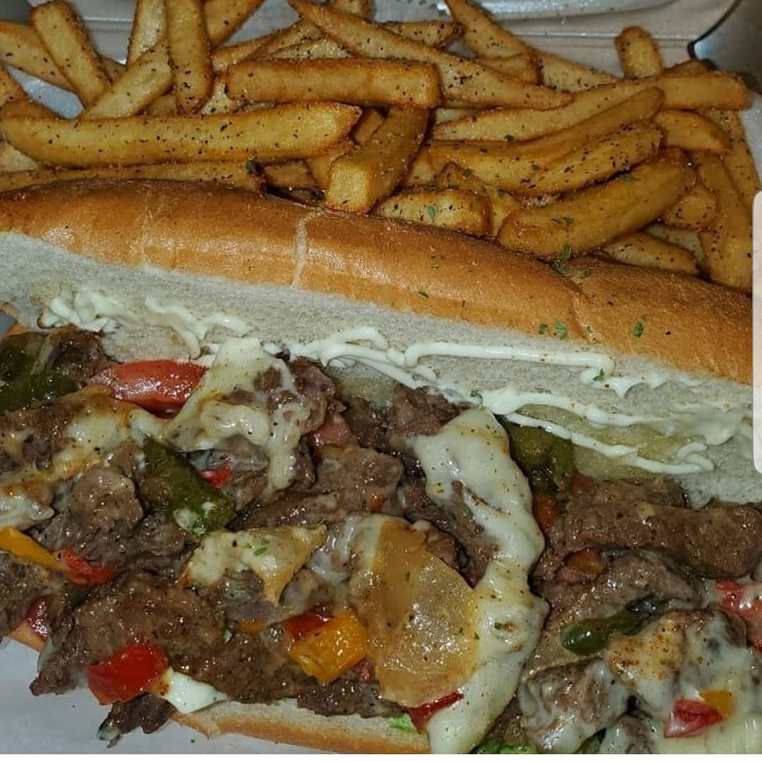 Order Steak & Cheese Sub with Fries food online from Soul Fusion Cafe store, Richmond on bringmethat.com