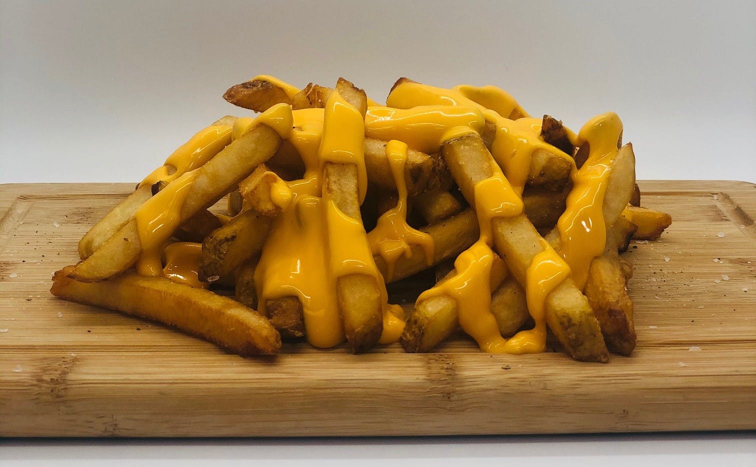 Order Cheese Fries - Small food online from Piezano Pizza store, Ocean City on bringmethat.com