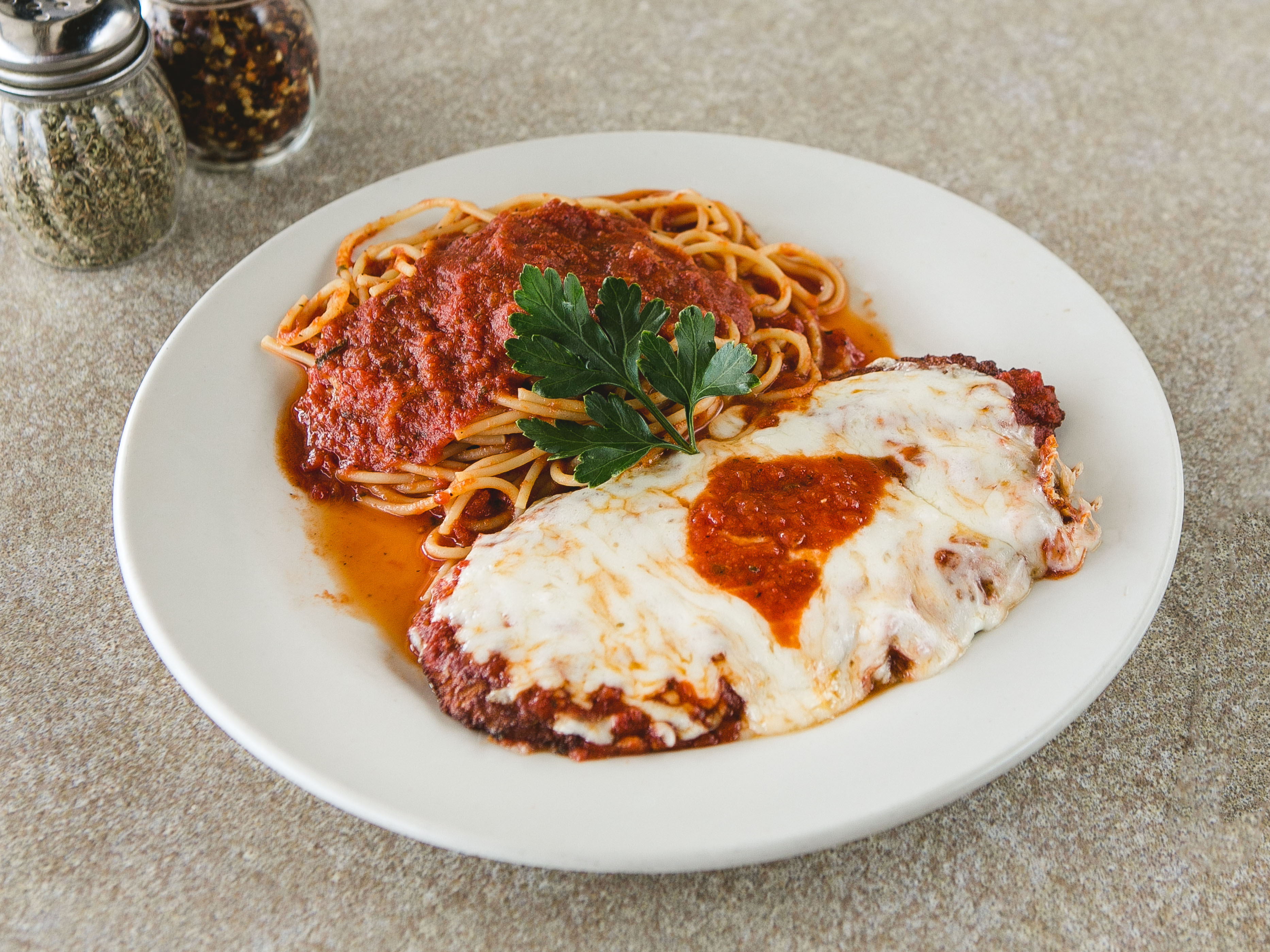 Order Chicken Parmigiana food online from The Pizza Stop store, Collegeville on bringmethat.com
