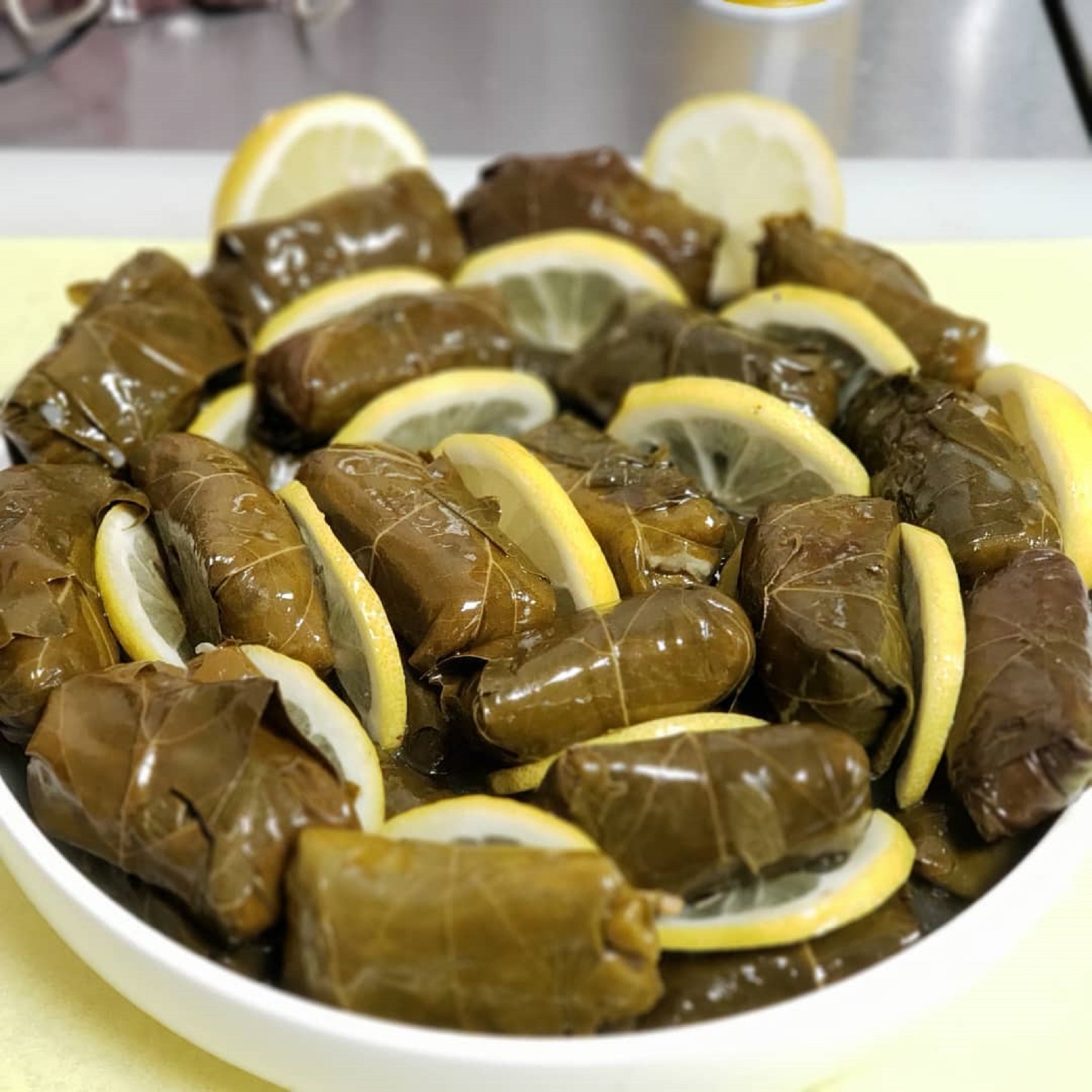 Order STUFFED GRAPE LEAVES (12 PIECES) food online from Basil Deli & Cafe store, Canoga Park on bringmethat.com