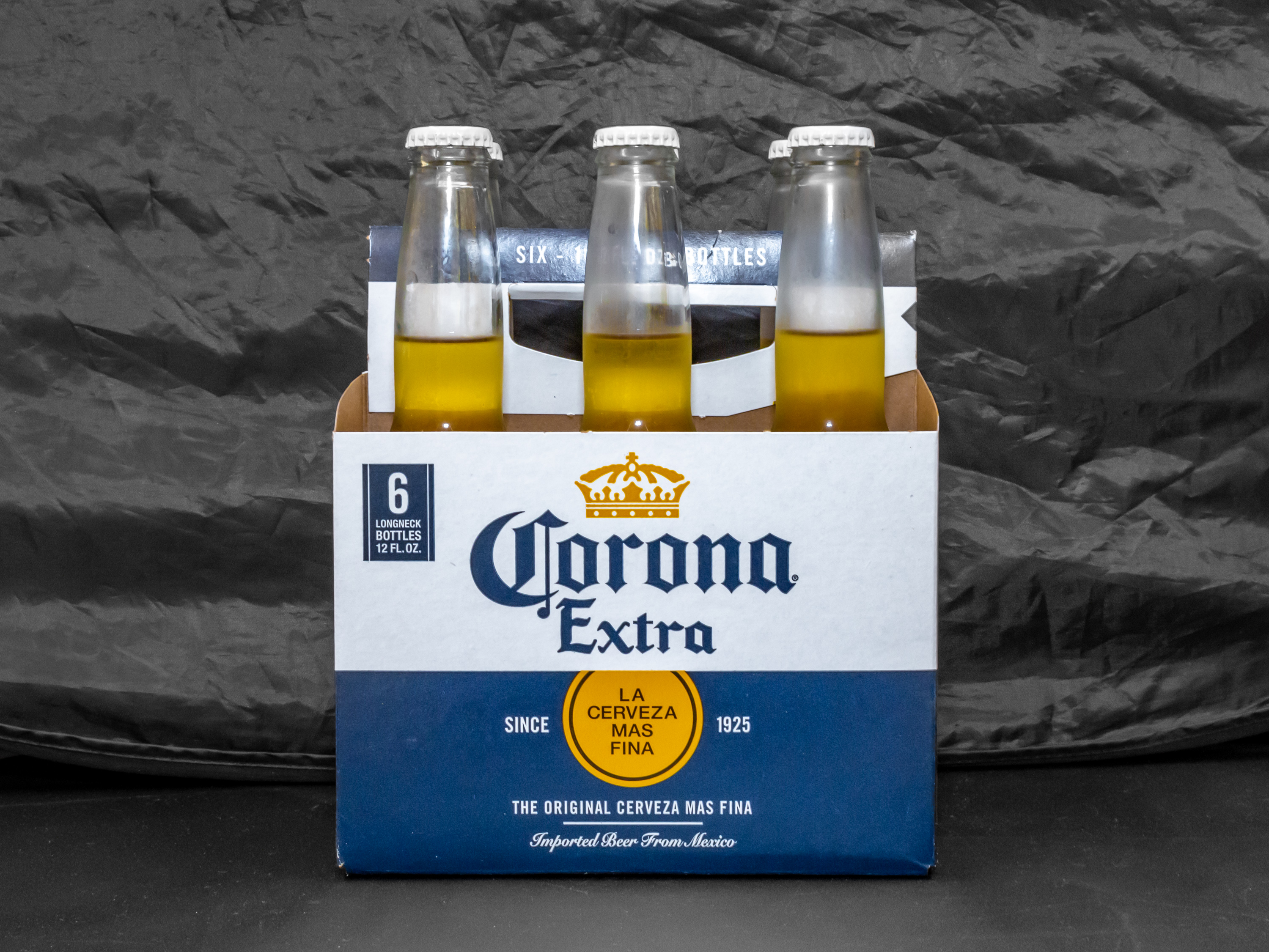 Order Corona extra, 6pk-12 oz. Bottle Beer (4.5% ABV) food online from Gold Crown Liquors store, Chicago on bringmethat.com