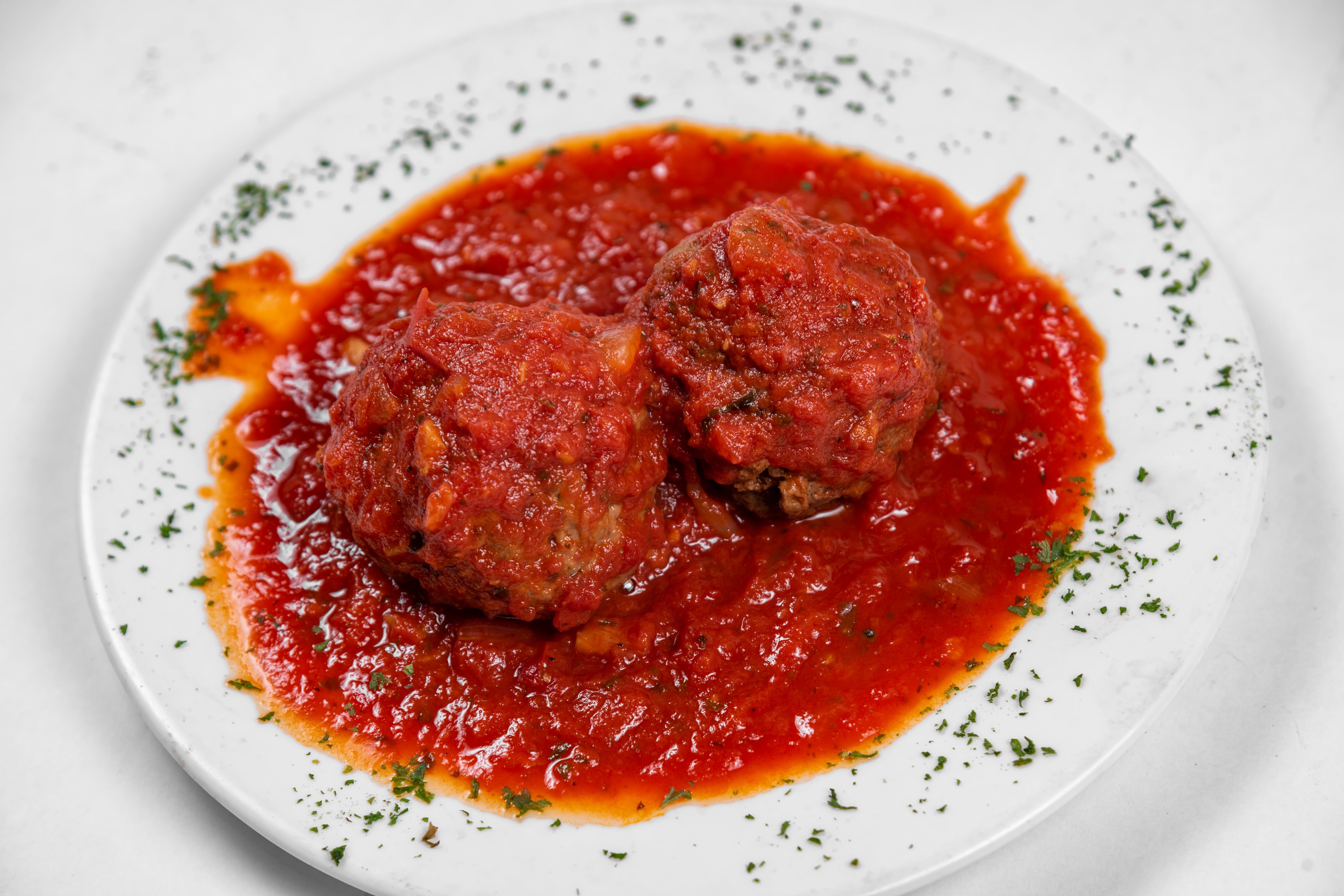 Order Meatballs with Tomato Sauce - Side food online from Joe & John's Pizzeria store, Ridgewood on bringmethat.com