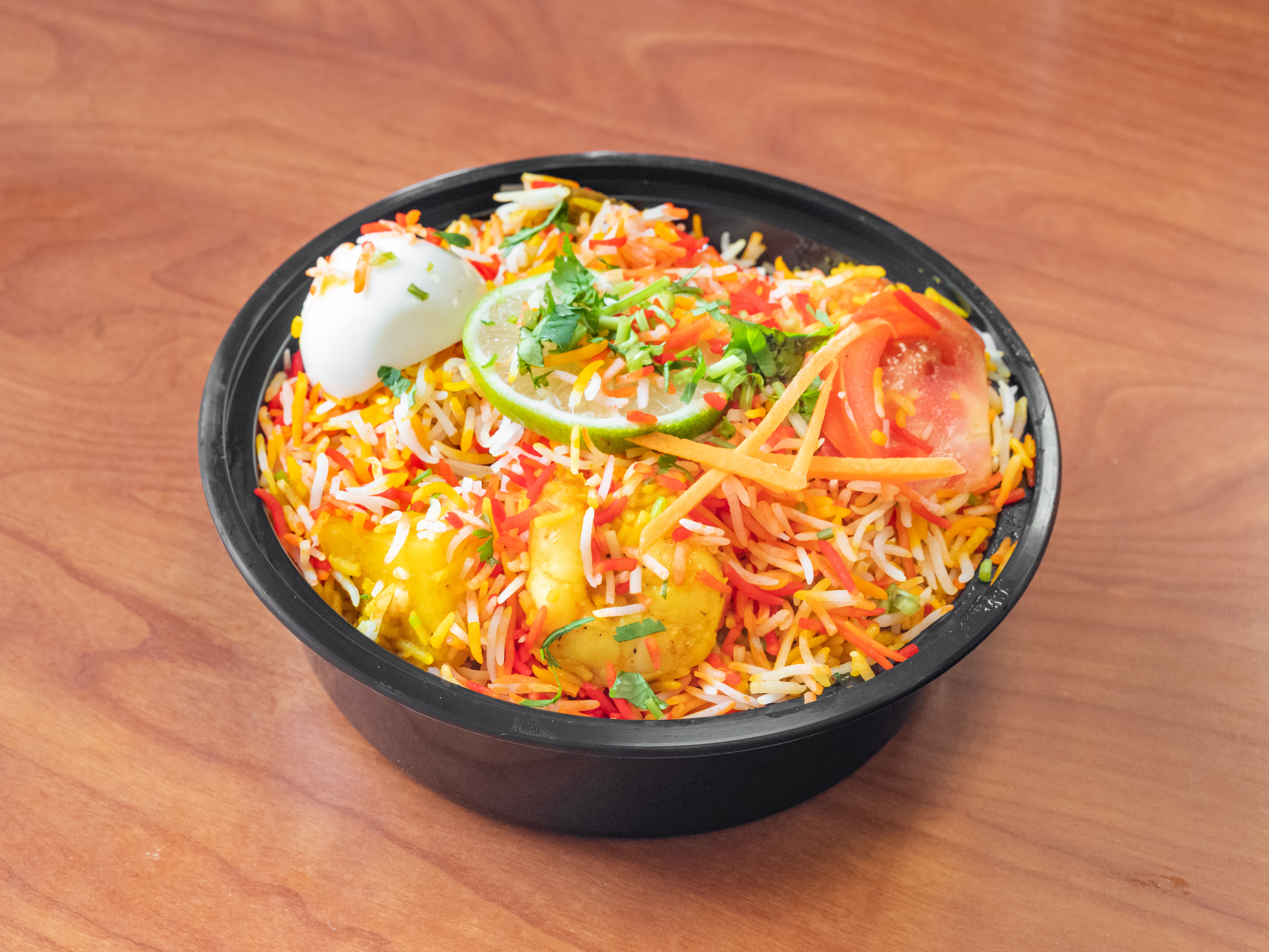 Order 66. Madina Special Biryani food online from Madina Indian Restaurant store, St. Clair Shores on bringmethat.com