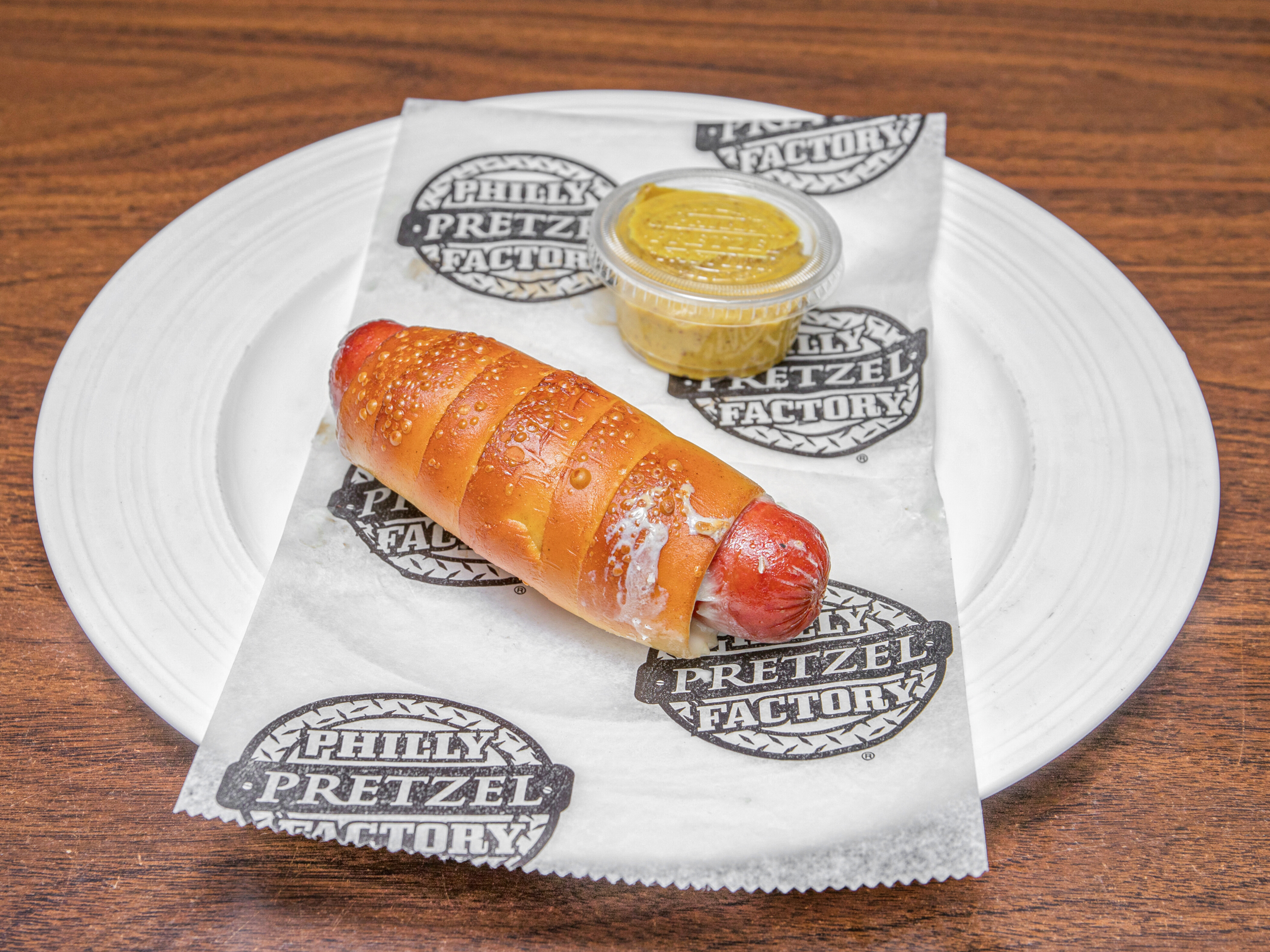 Order Spicy Pretzel Sausage  food online from Philly Pretzel Factory store, Easton on bringmethat.com