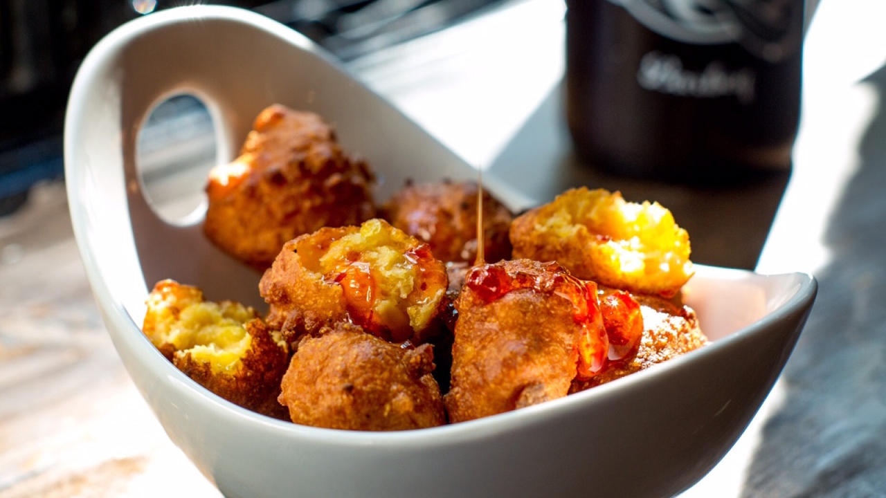 Order Sweet Corn Fritters food online from Mighty Quinn's Barbeque store, New York on bringmethat.com