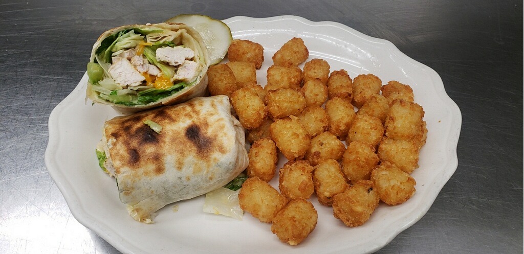 Order Grilled Chicken Wrap food online from 1st Place Sports Bar store, Hoffman Estates on bringmethat.com