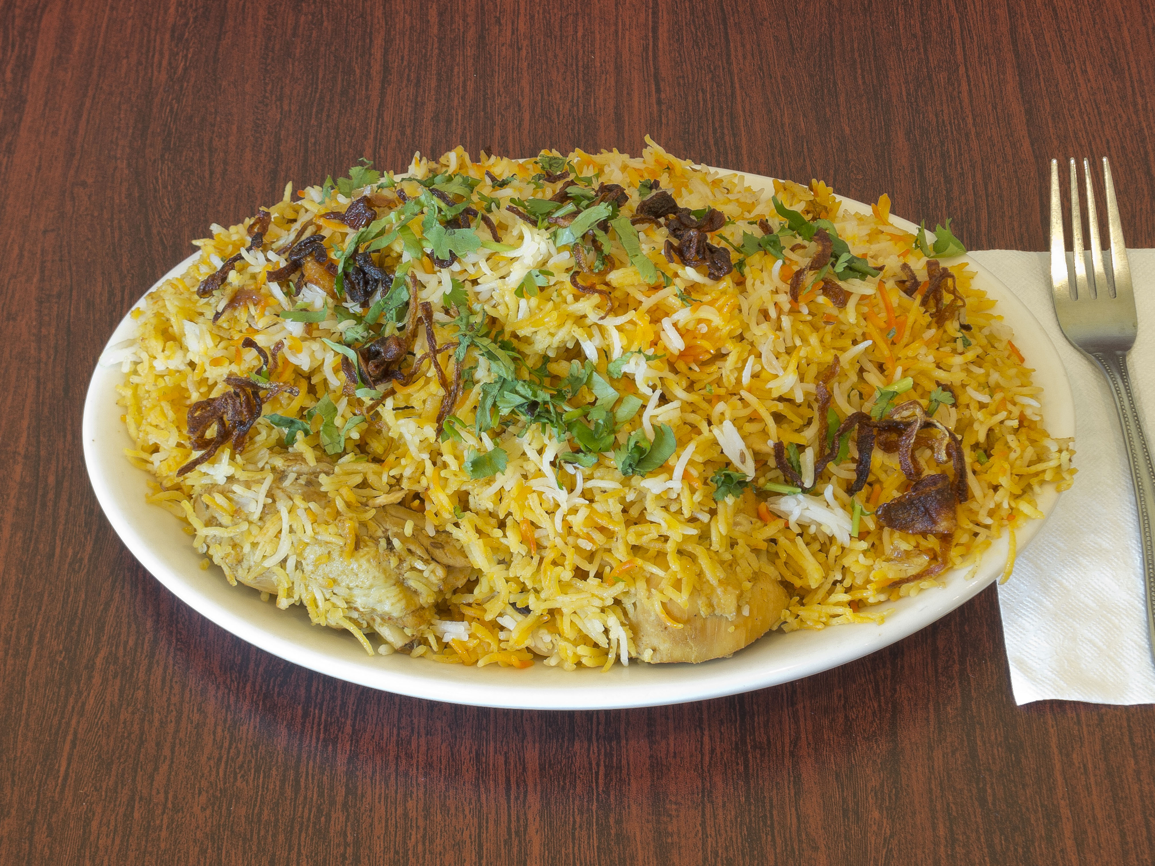 Order Chicken Biryani food online from Deccan Grill store, Irving on bringmethat.com