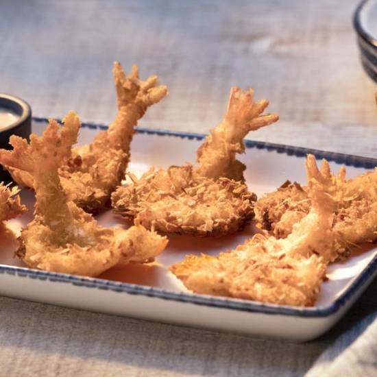 Order Parrot Isle Jumbo Coconut Shrimp Appetizer food online from Red Lobster store, Amherst on bringmethat.com