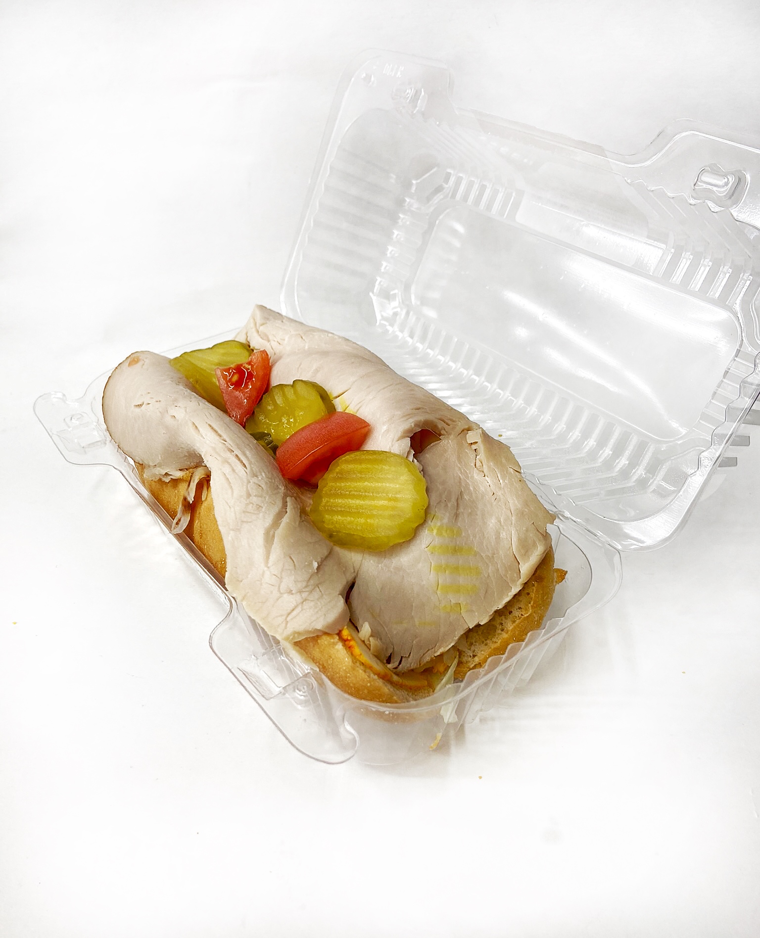 Order Turkey and Muenster Sub food online from EZ GO Foodmart store, Painesville on bringmethat.com