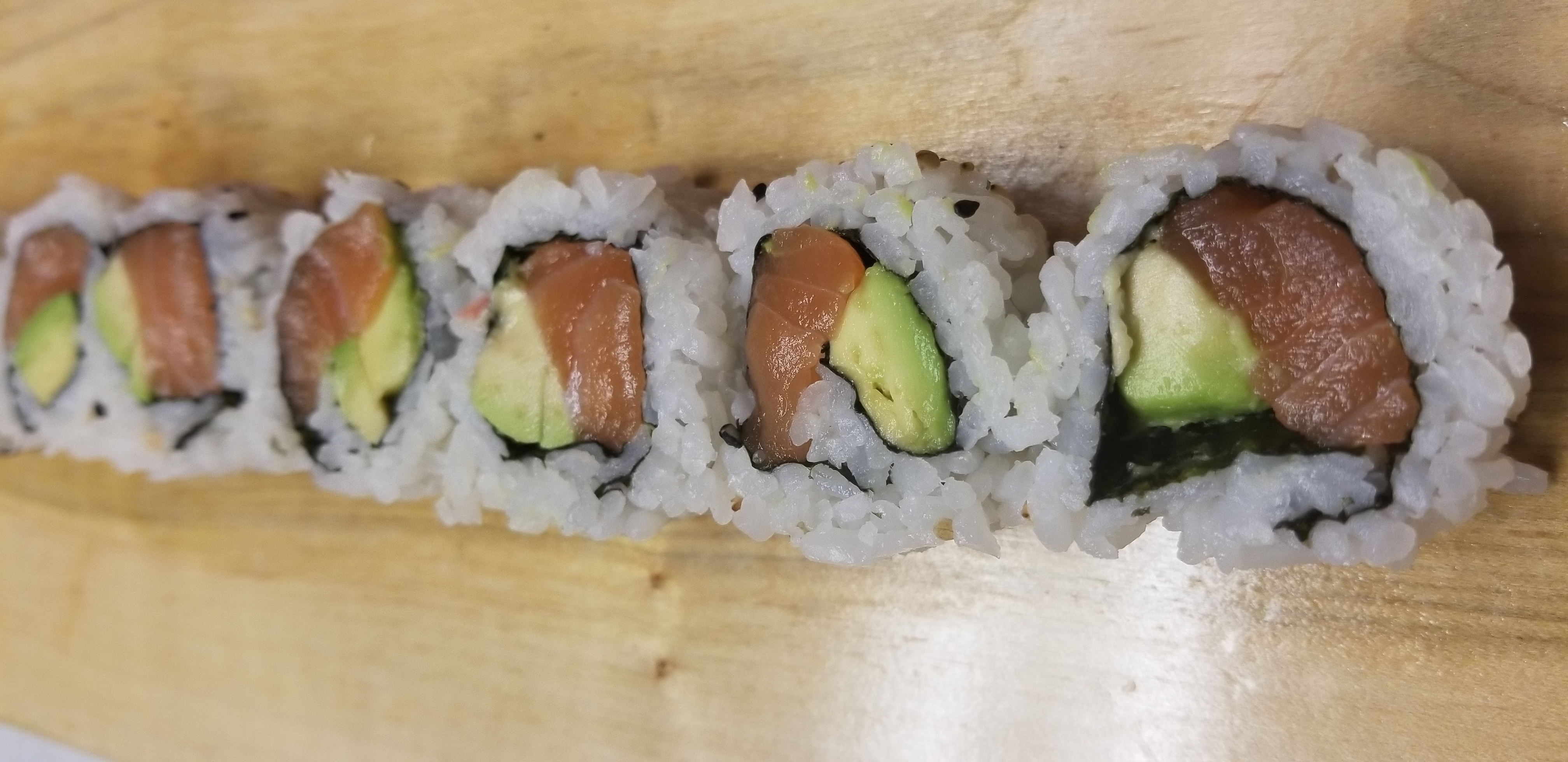 Order Salmon and Avocado Roll food online from Agami Contemporary Sushi store, Chicago on bringmethat.com